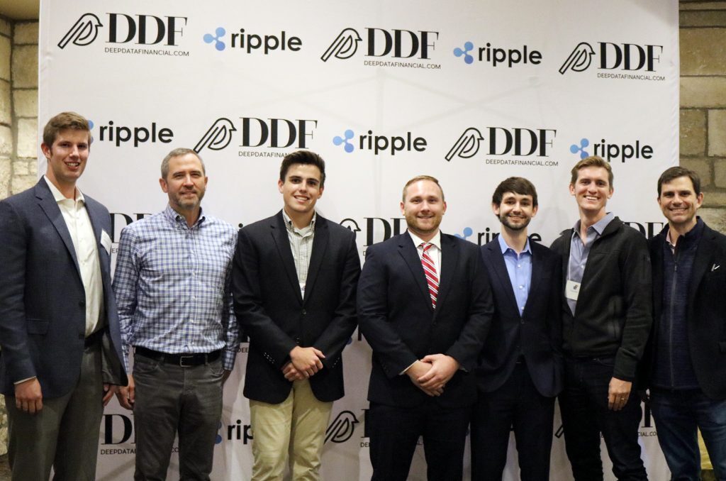Jack Schraad, Brad Garlinghouse, Nathan Nichols, Mason Qualls, Daniel Jones, Craig DeWitt, and Pat Thelen; Ripple and KU Blockchain Institute