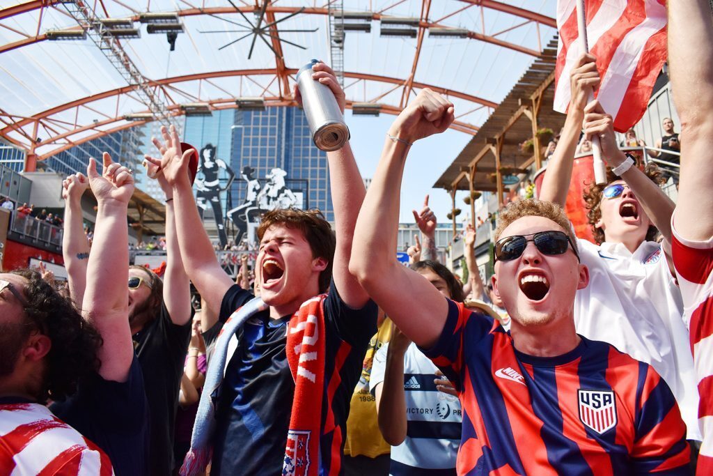 Fans react Thursday at Power & Light as news breaks that Kansas City will host during the 2026 World Cup; photos by Channa Steinmetz/Startland News