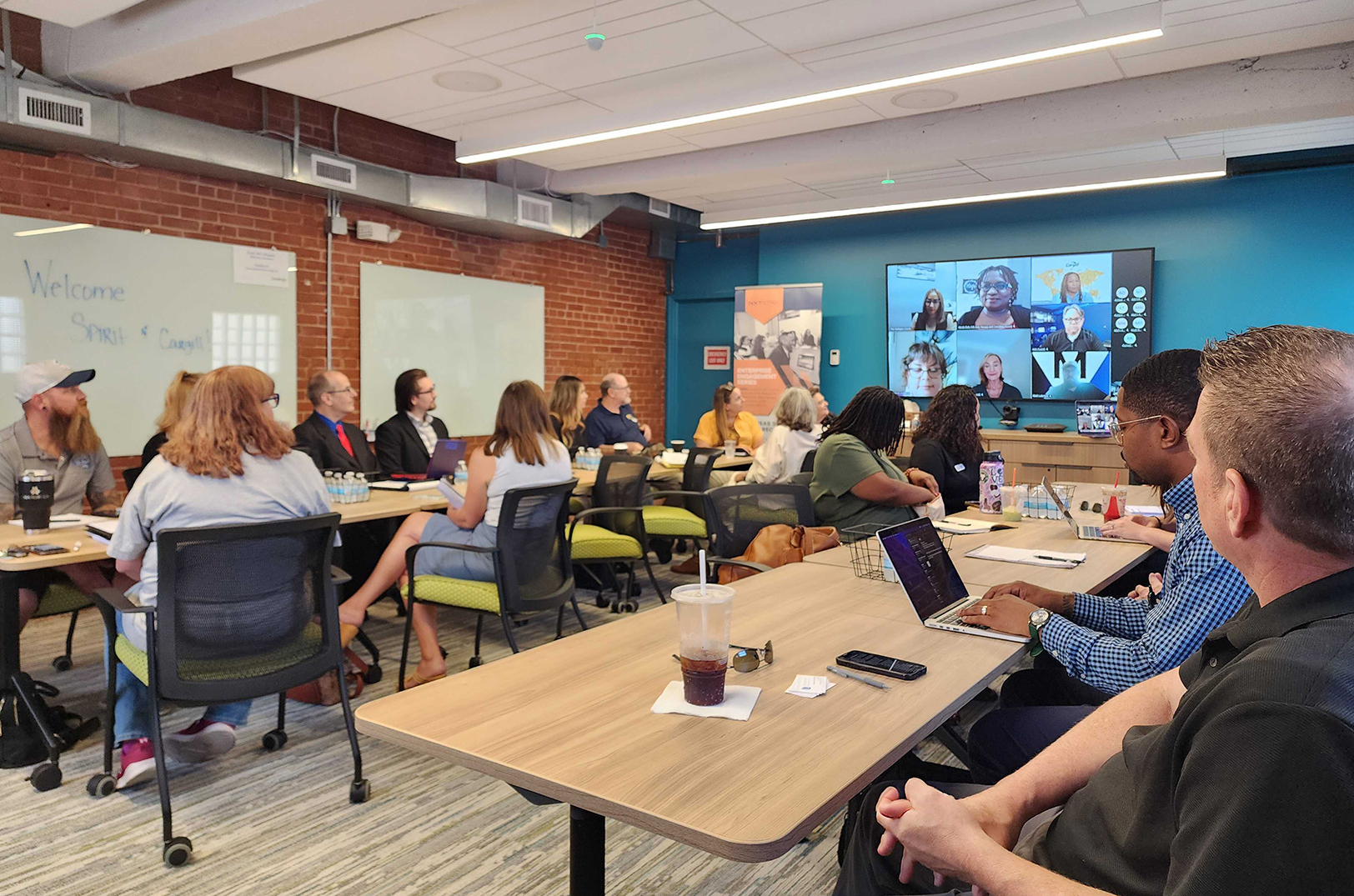 Entrepreneurs join NXTSTAGE organizers for a workshop during the 2023 cohort of the Enterprise Engagement Series; photo courtesy of NXTUS