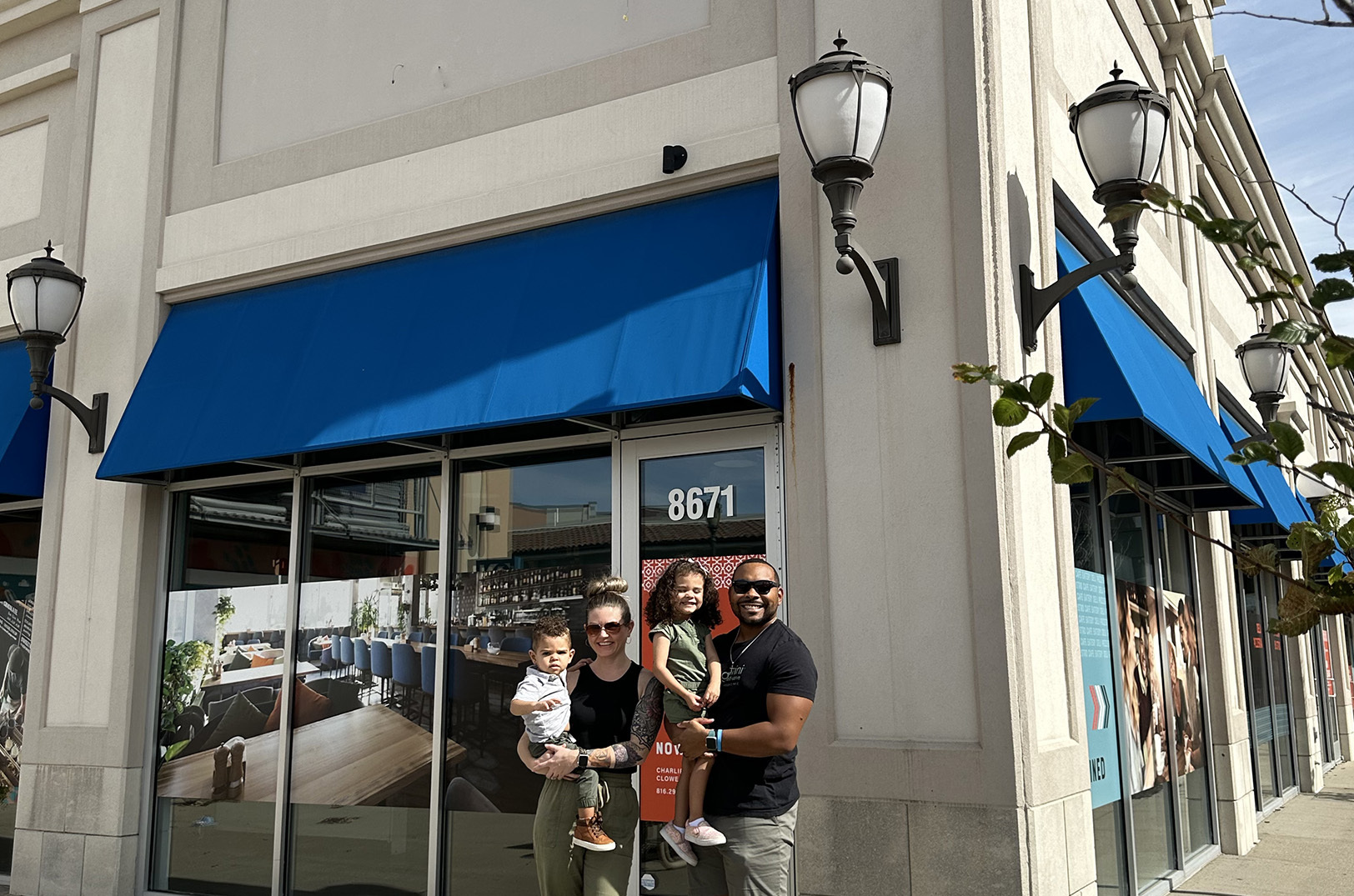Isaac Lee V,  Rachel, Emery, and Isaac Lee  Collins IV, outside the future Zona Rosa location for Fifth & Emery Frozen Yogurt and Chocolate; courtesy photo