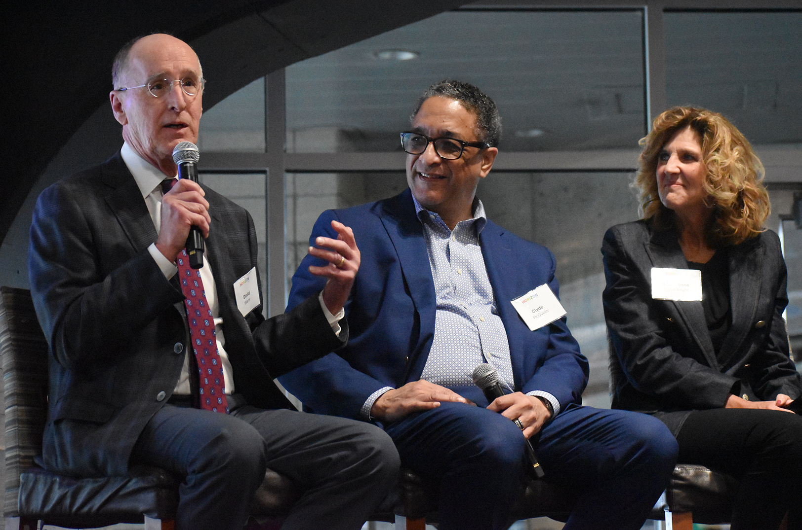 David Warm, executive director of the Mid-America Regional Council, speaks alongside Clyde McQueen, Full Employment Council, and Leigh Anne Taylor Knight, The DeBruce Foundation, during KC Rising's Horizon event at Kauffman Stadium; photo by Taylor Wilmore, Startland News
