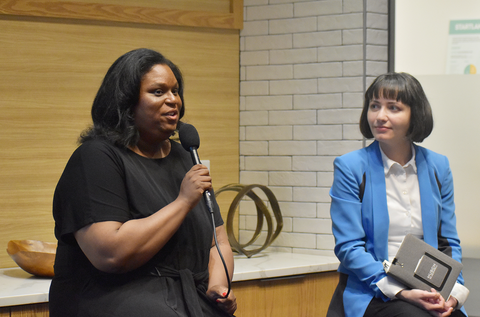 Emily Brown, Attane Health, speaks alongside Olga Shupyatskaya, Husch Blackwell, during a May 2025 Startland News Innovation Exchange event, presented by Morgan Stanley at Spark Coworking; photo by Taylor Wilmore, Startland News