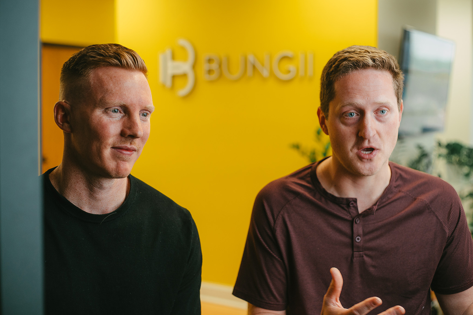 Harrison Proffitt and Ben Jackson discussing Bungii's journey at the company's Overland Park headquarters; photo courtesy of Social Apex Media