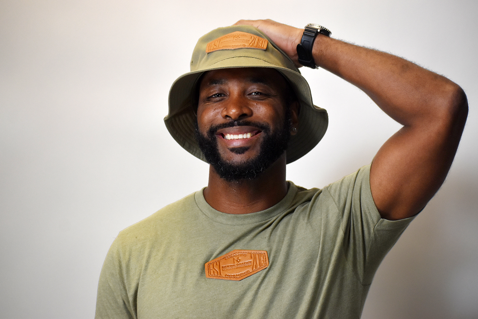 Renauld Shelton II sports the Heritage Crown bucket hat from Material Opulence's Legacy Standard collection; photo by Taylor Wilmore, Startland News