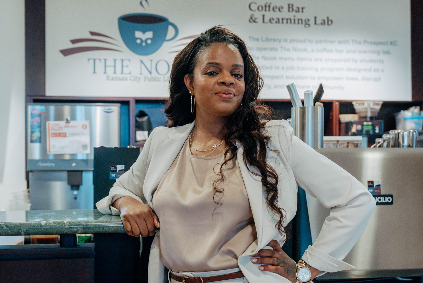 Chef Shanita McAfee-Bryant stands in “The Nook,” the coffee shop at Kansas City’s Central Library where her organization Prospect KC provides hands-on hospitality training; photo courtesy of Shanita McAfee-Bryant, The Prospect KC