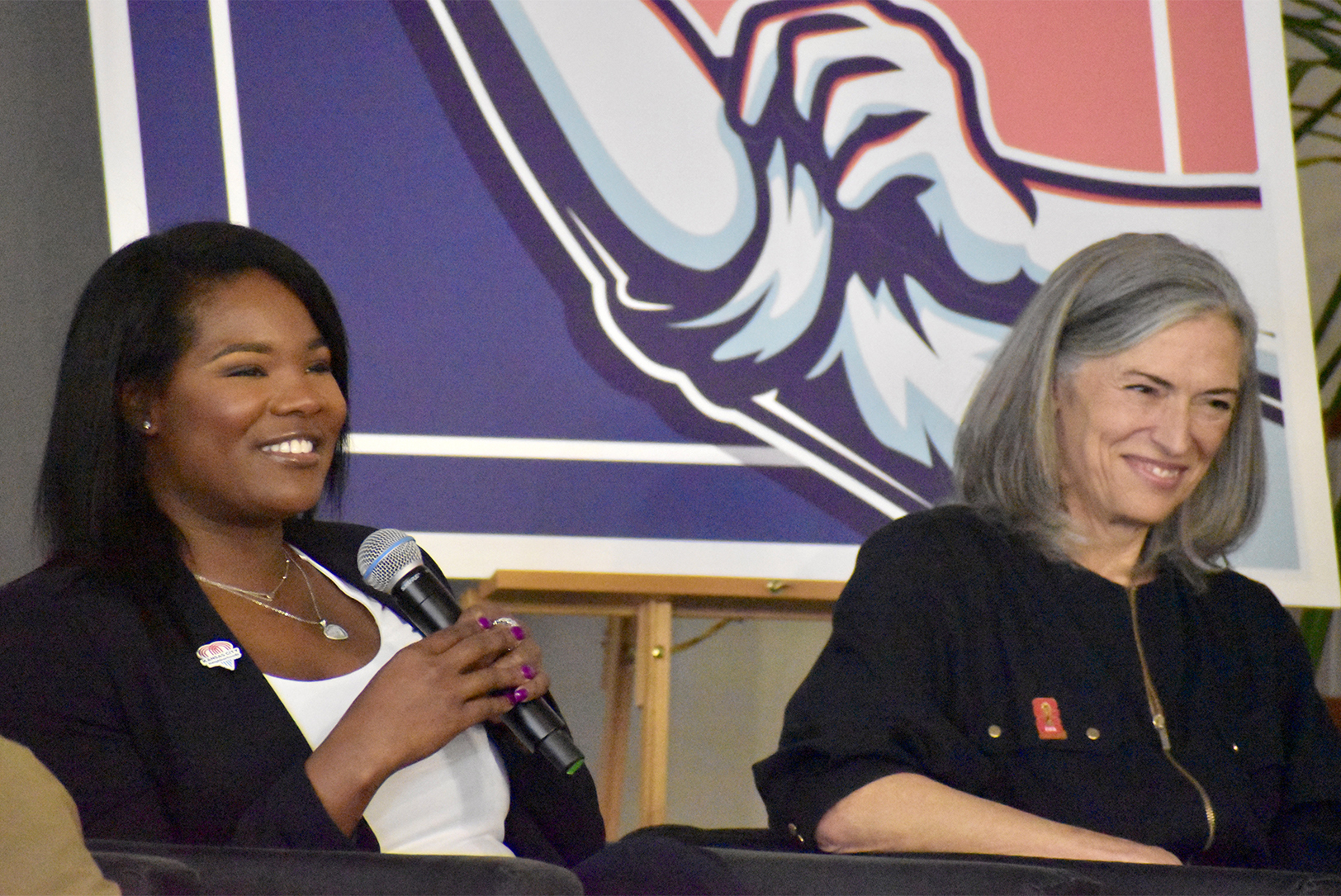 Janá Wagner, division manager for KC BizCare, shares a laugh with Tracy Whelpley, director of regional impact for KC2026, during a panel discussing the FIFA World Cup and small business; photo by Nikki Overfelt Chifalu, Startland News