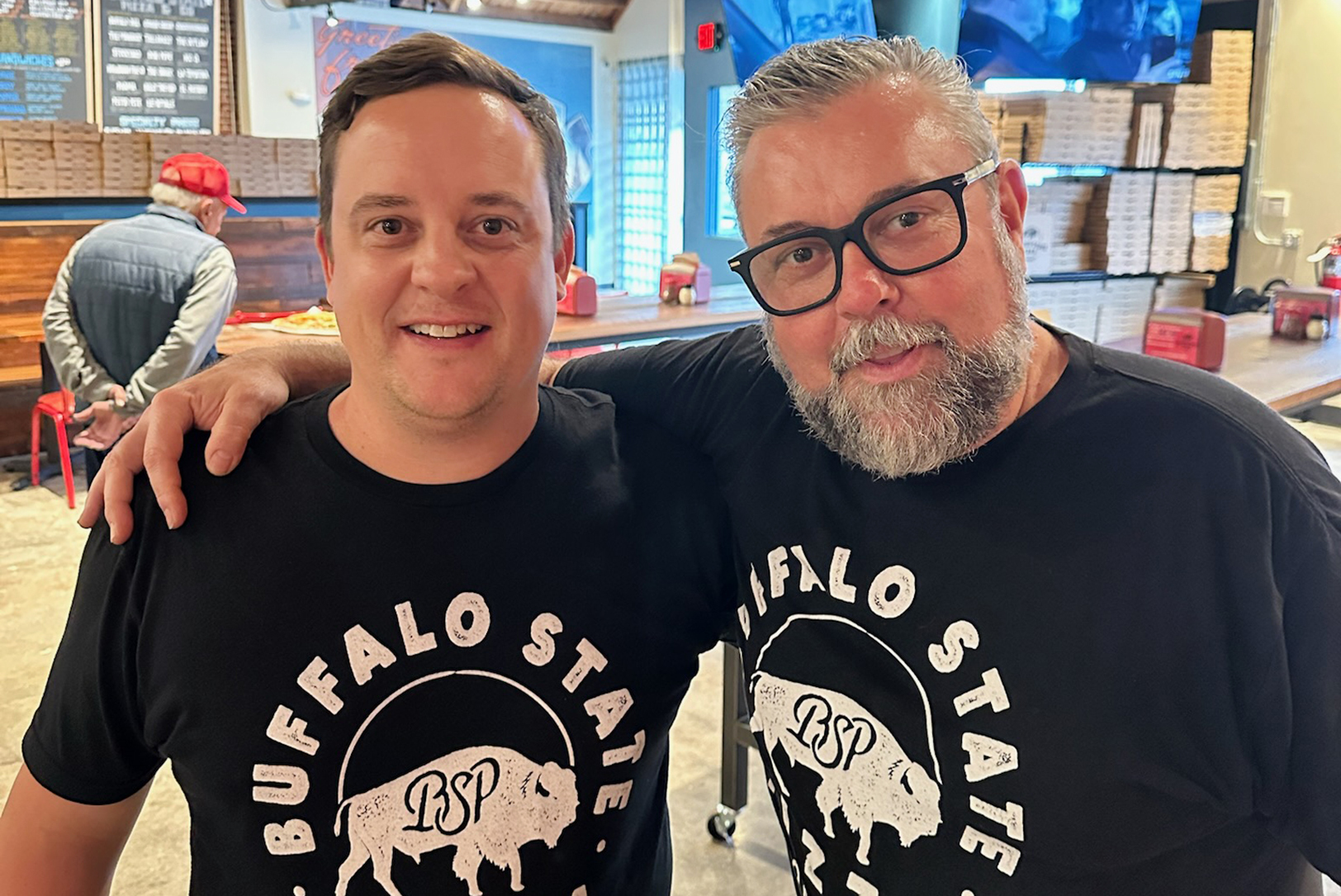 Steve Robson and Philippe Lechevin, chefs and co-owners at Buffalo State Pizza Co., stand inside the pizzeria's new Overland Park location at 7932 Santa Fe Drive; photo by Joyce Smith