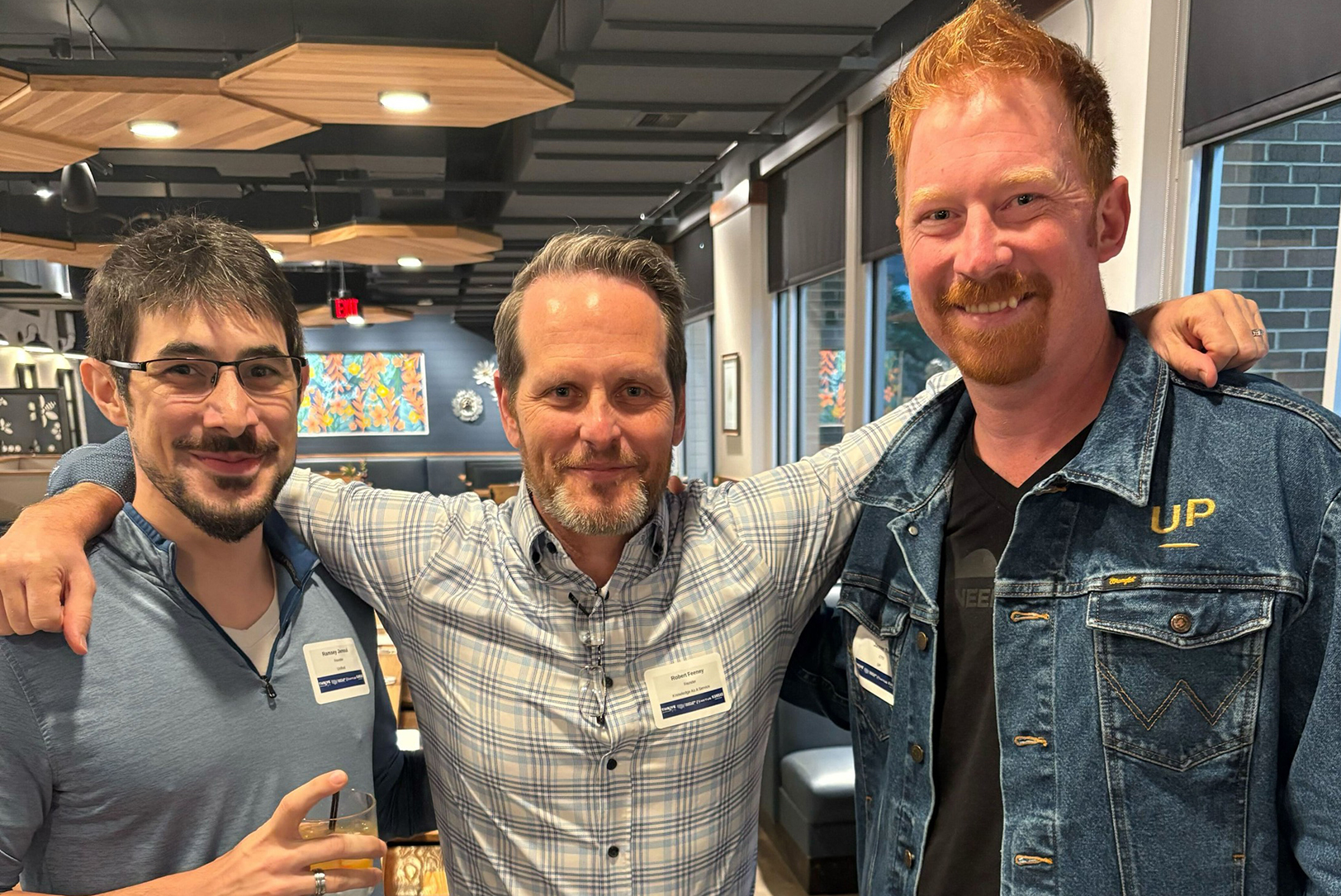 Wichita tech leaders Ramsey Jamoul, Unified Esports Association, Robert Feeney, Knowledge as a Service, Inc. (KaaS), and Jason Toevs, UP, at a recent AI meetup hosted by Heartland Forward, the Kansas Department of Commerce, and NXTUS; photo courtesy of NXTUS