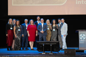 Members of the BioNexus KC team stand on stage at the Midland Theater in November during a 25th anniversary event honoring BioNexus KC; photo courtesy of BioNexus KC