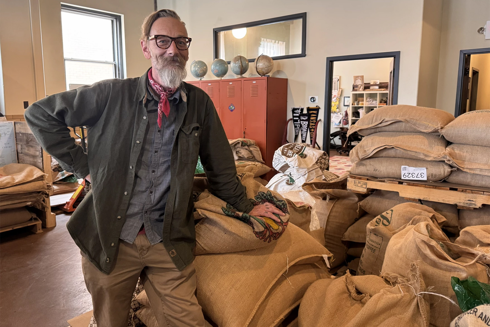 Jon Cates buys coffee from around the world to roast in Kansas City, Missouri. He has spent years building relationships and visits farmers in Nicaragua each year; photo by Skyler Rossi, Harvest Public Media