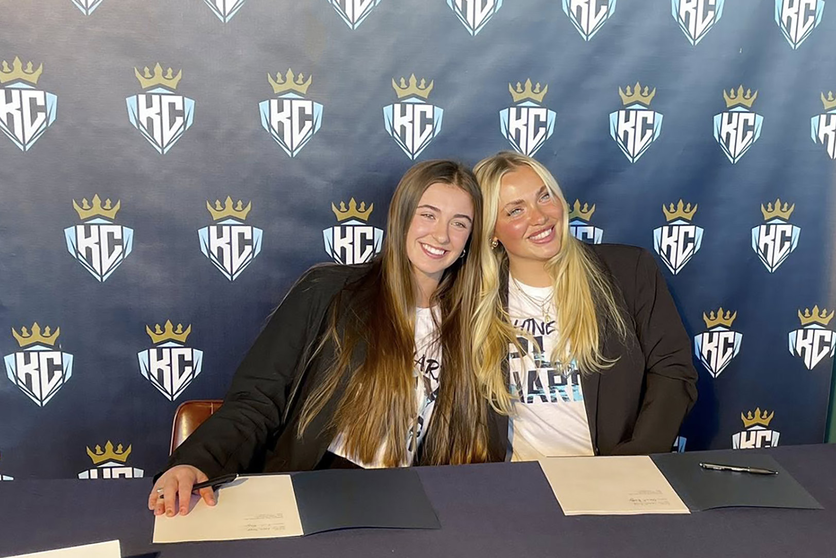 KC Diamonds players Leah Boggs and Savanah Henley pose together at a launch announcement event for the team at Legends Field in Kansas City, Kansas; courtesy photo