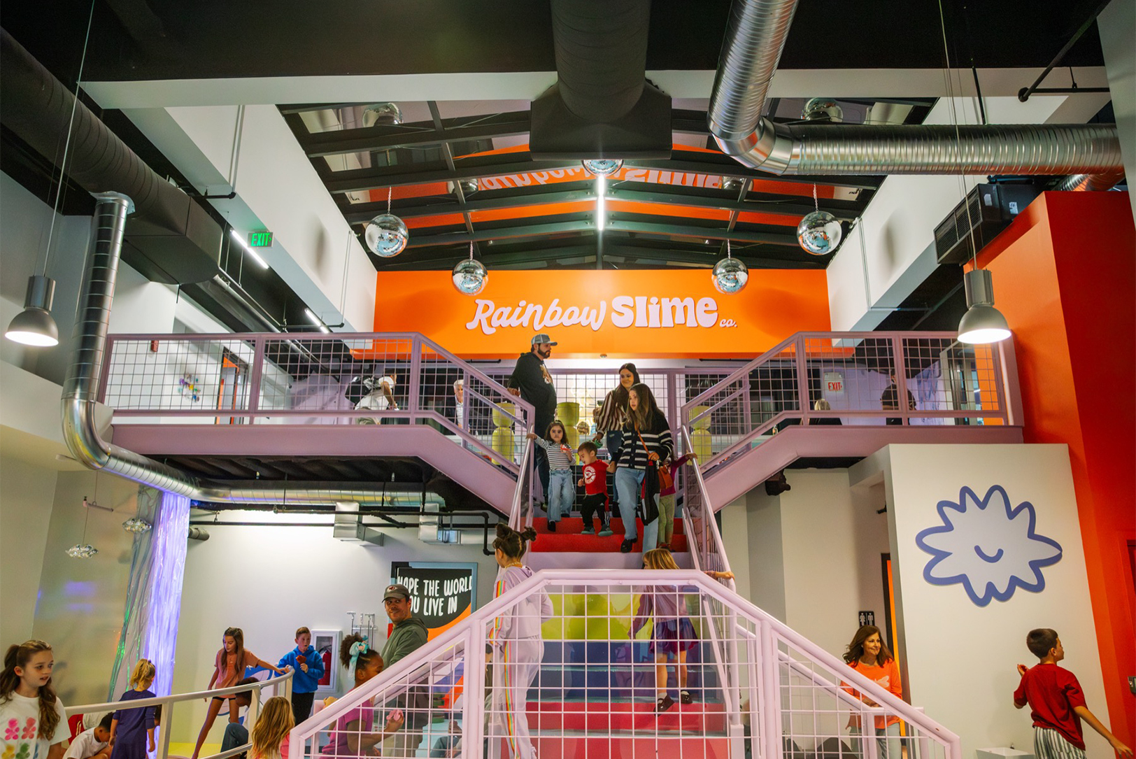 Children and parents rush into Rainbow Slime Co. at Union Station; photo by Alyssa Broadus