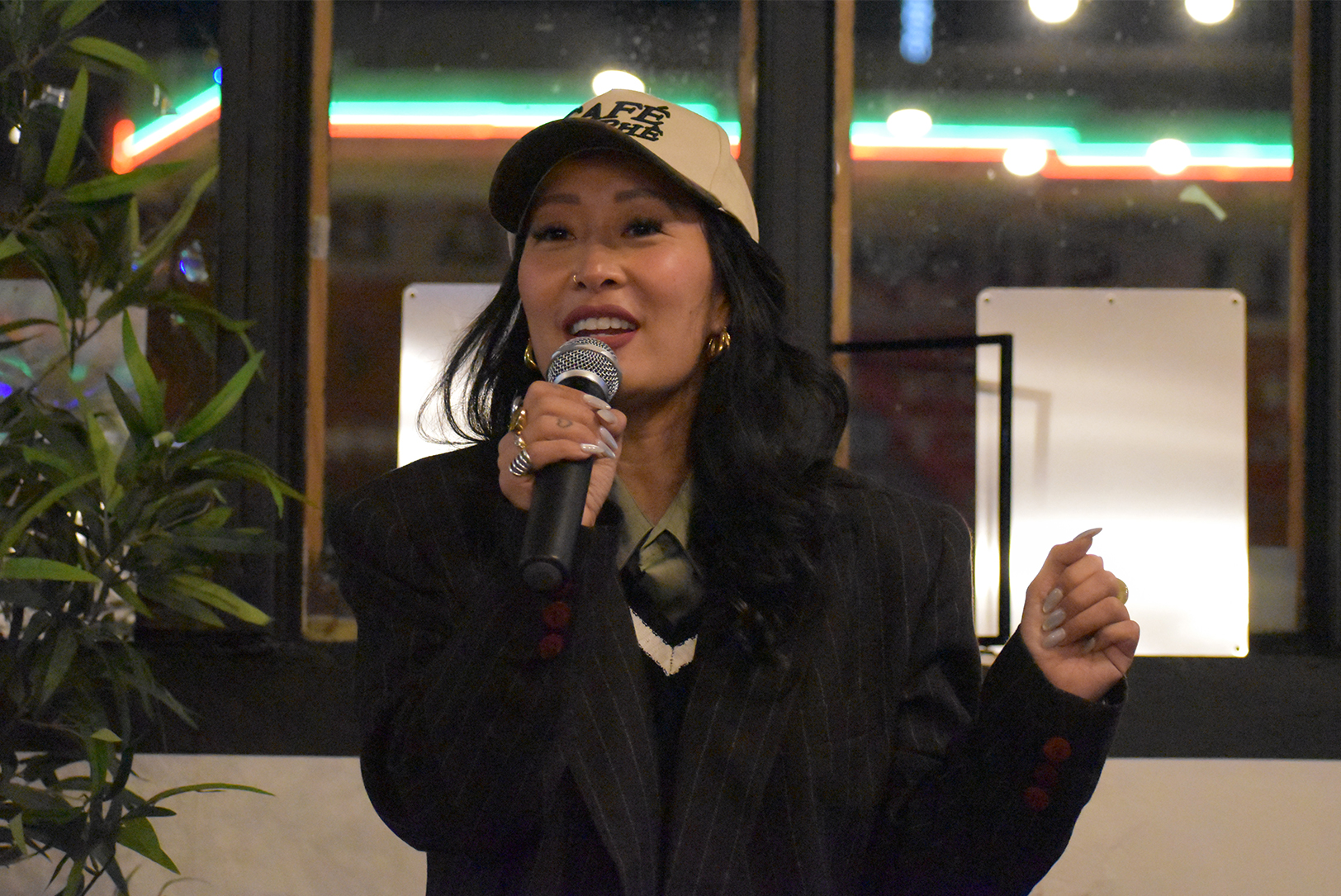 Jackie Nguyen, founder of Café Cà Phê, shares her journey with Blueprint Weekend attendees at the streetwear brand MADE MOBB's Southwest Boulevard headquarters; photo by Taylor Wilmore, Startland News