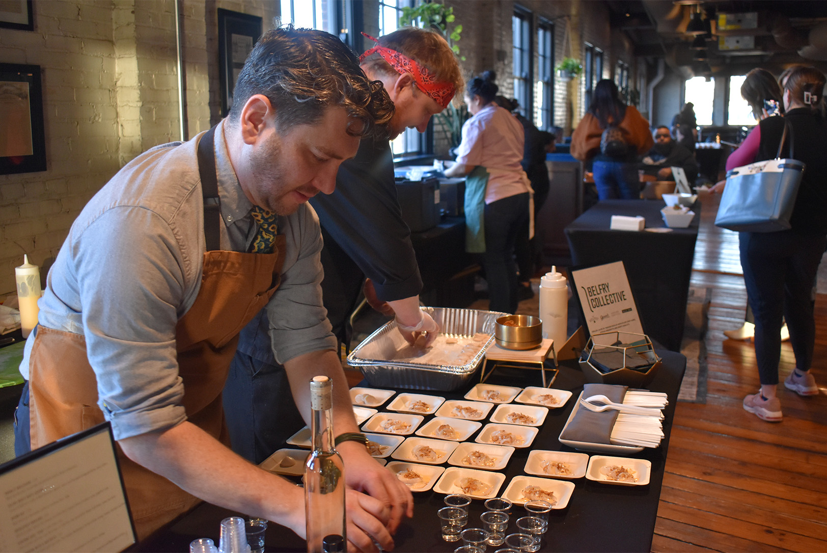 Chefs from Belfry Collective plate samples during a preview event for the 10-day Kansas City Restaurant Week at J. Rieger & Co.; photo by Taylor Wilmore, Startland News