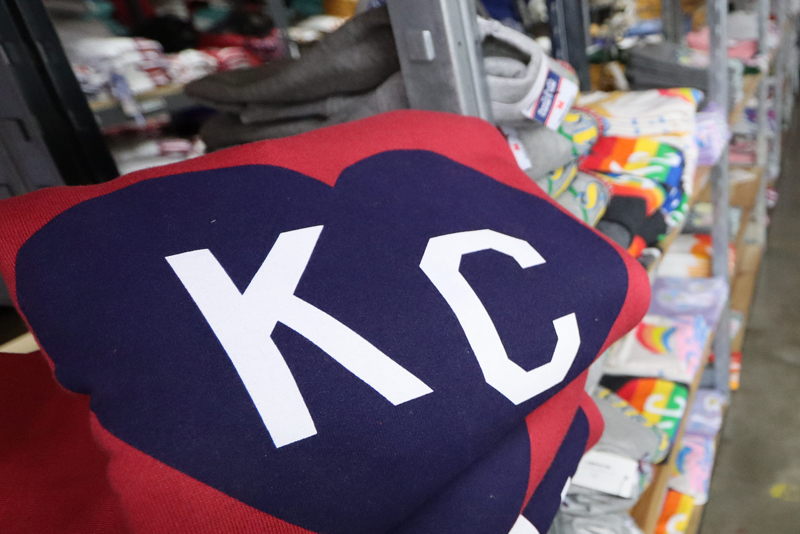 Charlie Hustle apparel sits ready for purchase in a company stockroom; photo by Haines Eason