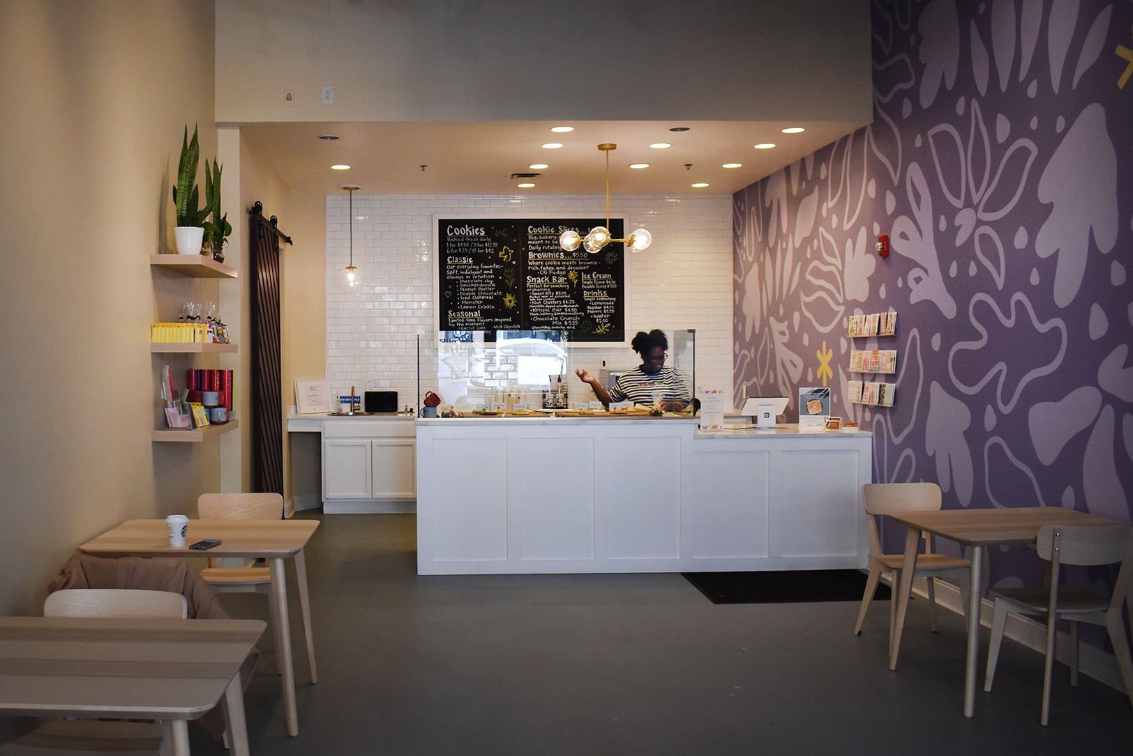 Ebony Paul, founder of Brown Suga Bakes, works behind the counter at her Leawood cookie shop; photo by Taylor Wilmore, Startland News