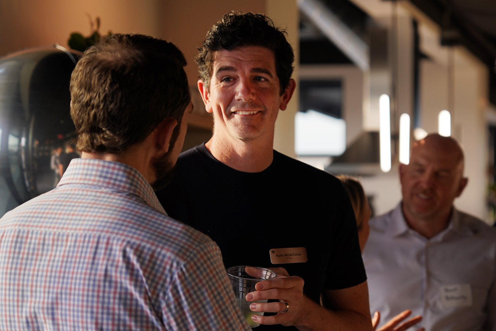 Kyle McAllister, co-founder of Trially, a Redbud VC portfolio company, right, speaks with Phil Reynolds, DevStride, at the 2025 Missouri Startup Weekend; photo by Ryann Schenewerk, EquipmentShare