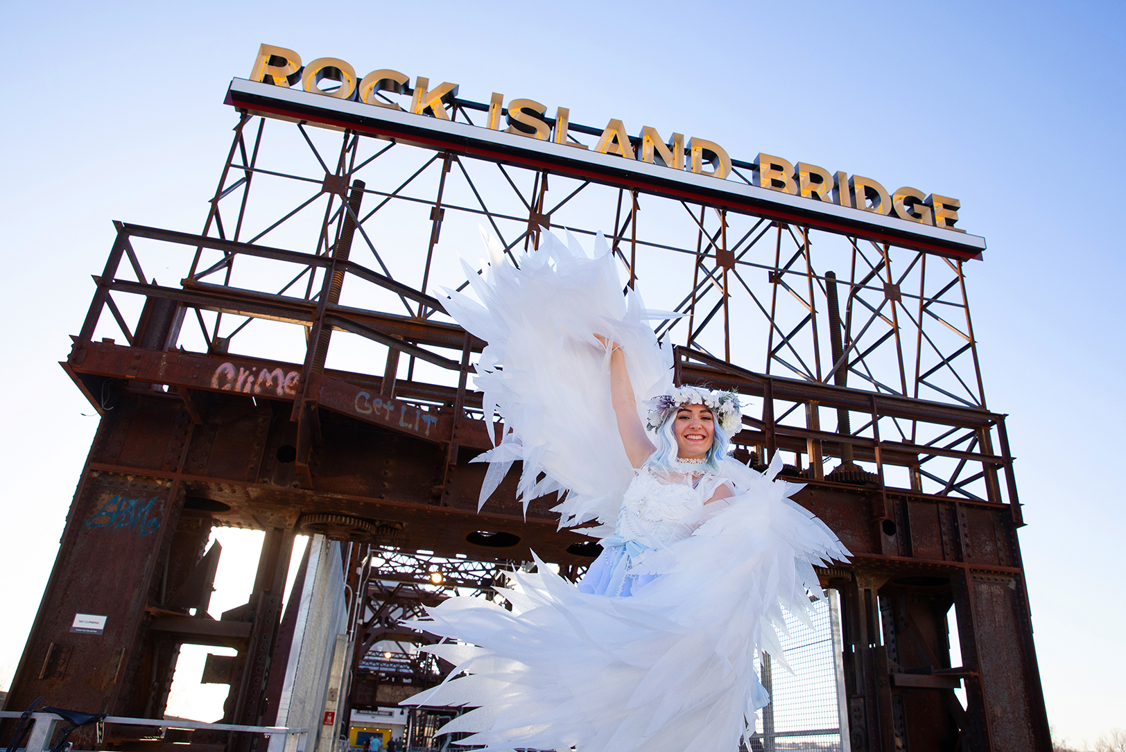 A performer dances near the entrance to the Rock Island Bridge during a March preview event; courtesy photo