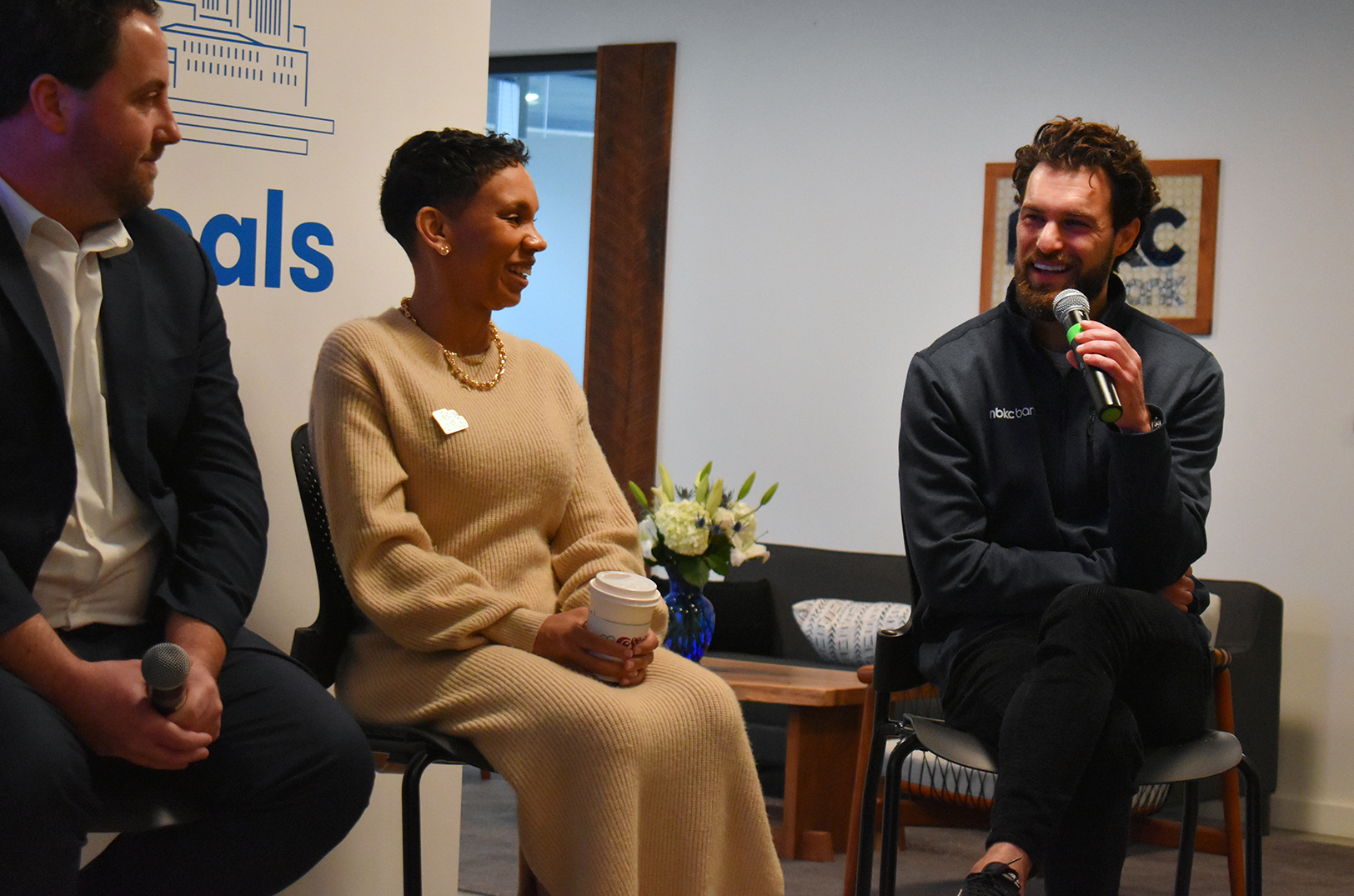 Graham Zusi, former Sporting Kansas City superstar, right, speaks during a World Cup panel at nbkc bank; photo by Taylor Wilmore, Startland News