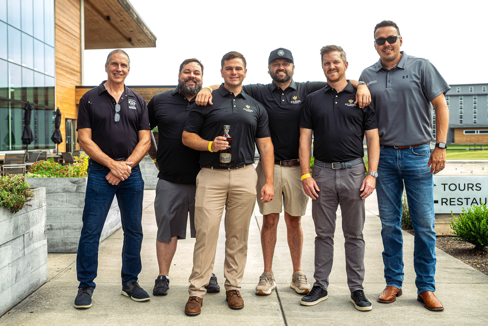 The H.K. Young Bourbon Co. leadership team — Darrick Jackson, Cole "CG" Hanna, Tyler Young and Spencer Kilijian — pictured with the brand's Tennessee distributor and a representative from Bardstown Bourbon Company; courtesy photo