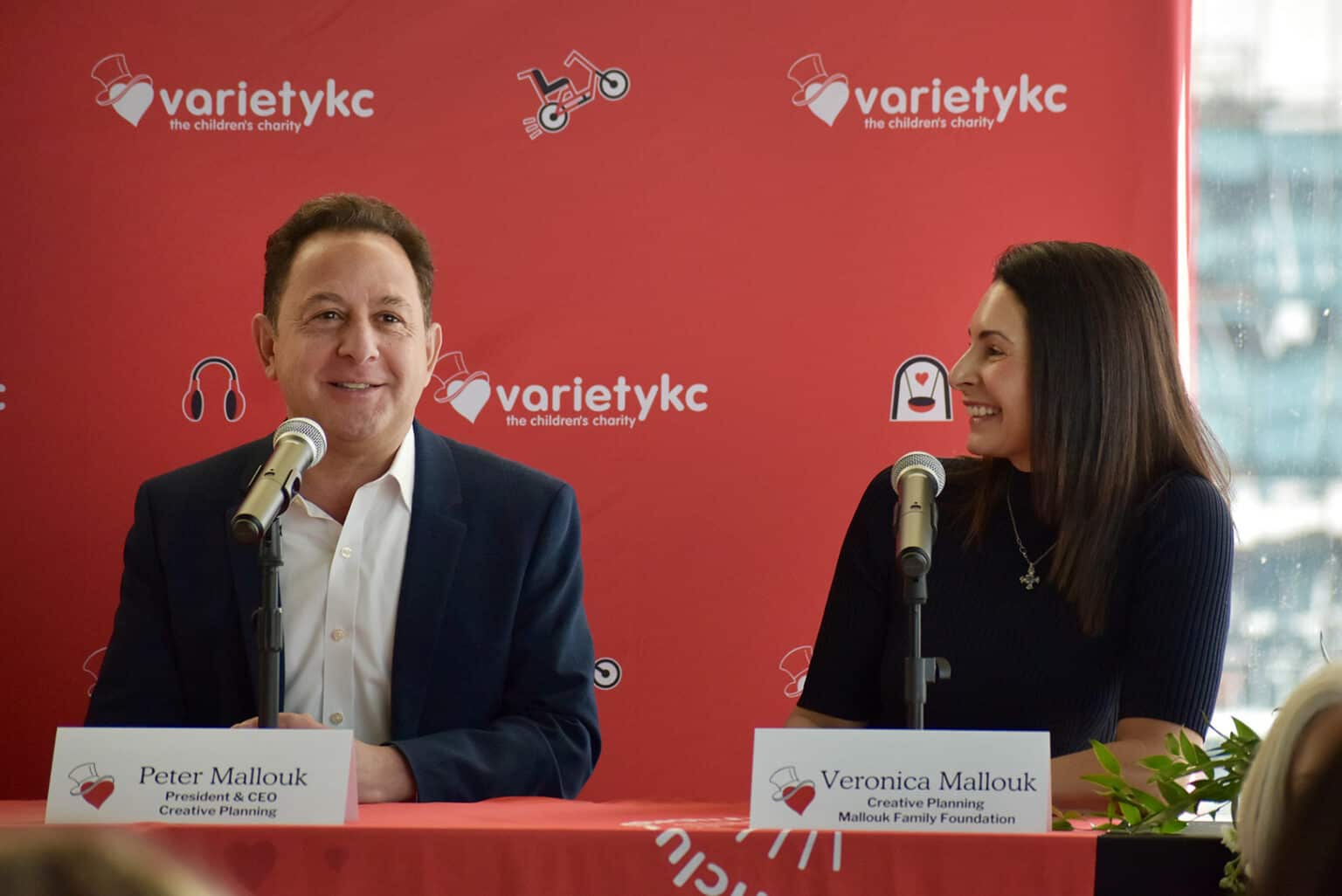 Peter and Veronica Mallouk announce a $5.1 million investment — part of a $30 million initiative — during a press conference at the Blue Cross Blue Shield office building overlooking the future Roy Blunt Luminary Park; photo by Nikki Overfelt Chifalu, Startland News