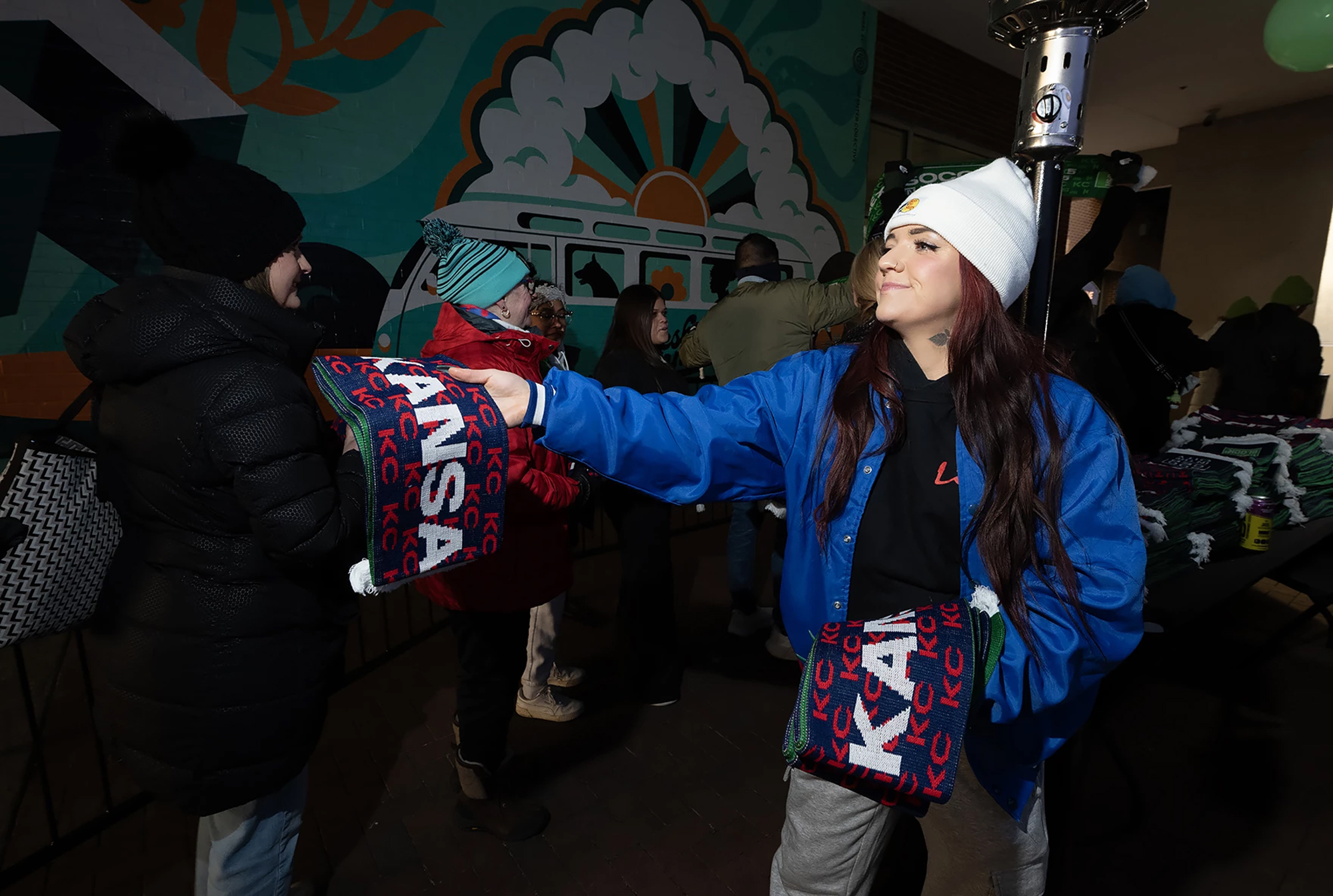 The first thousand fans received a World Cup scarf as they arrived this winter at a region-wide watch party for the FIFA Final Draw in December at KC Live! in the Power & Light District; photo by Julie Denesha, KCUR
