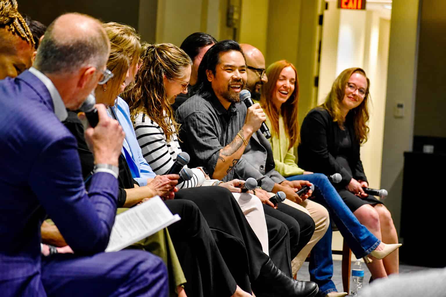 Vu Radley, co-founder of MADE MOBB, shares a laugh with fellow panelists at Union Station during a CEO conversation for the KC Chamber's Small Business of the Year honor; photo by Nikki Overfelt Chifalu, Startland News