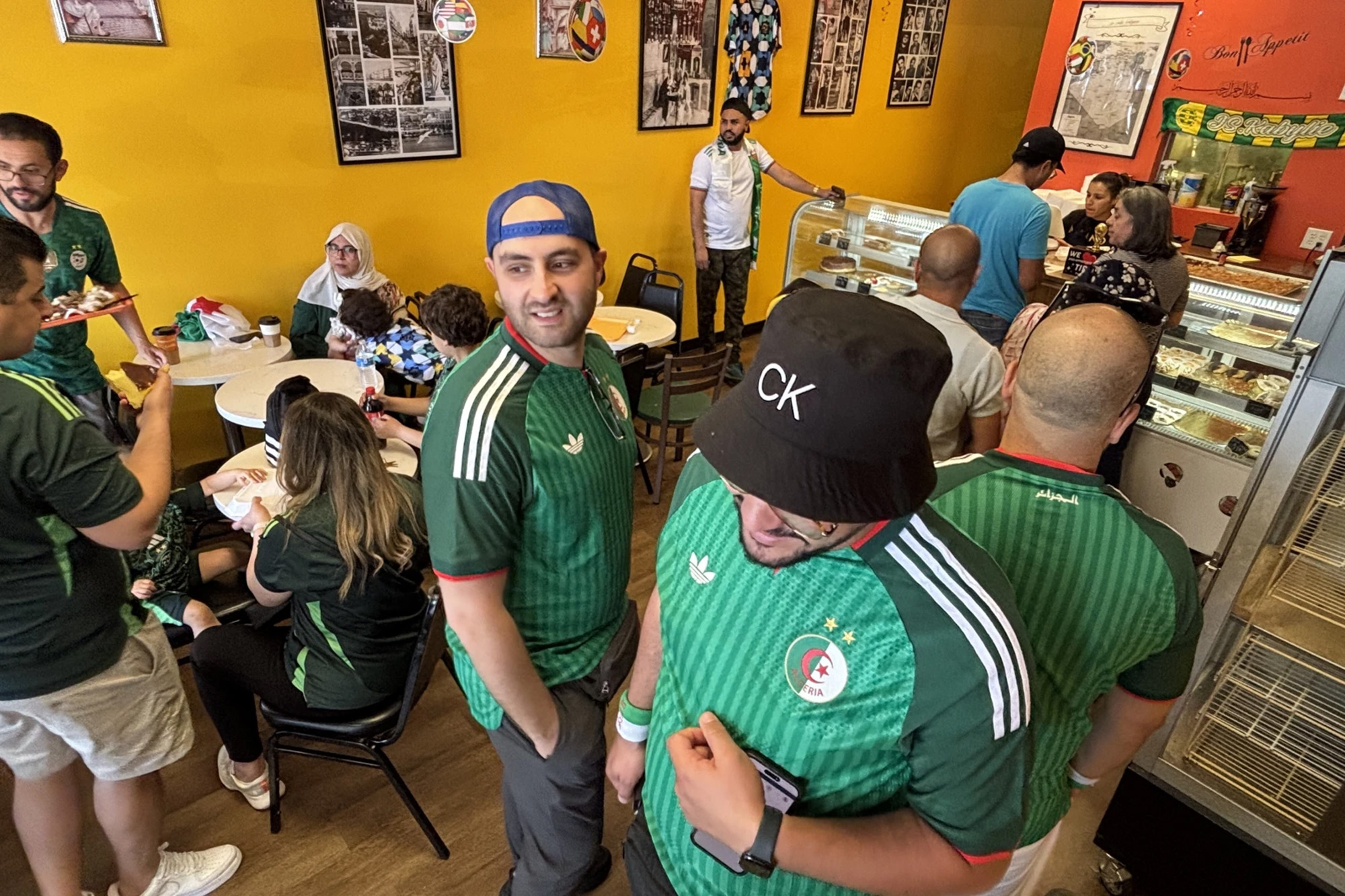 Algerian soccer fans inside the Lenexa bakery Algerian Delights; photo by Laura Ziegler, KCUR