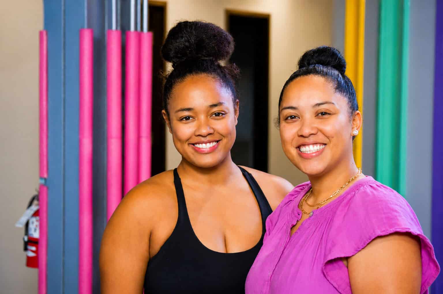 Sisters Arielle Houston and Antoinette Redmond, co-founders of Bubbles and Goo, stand together at the new River Market space at 512 Delaware St.; photo by Tommy Felts, Startland News