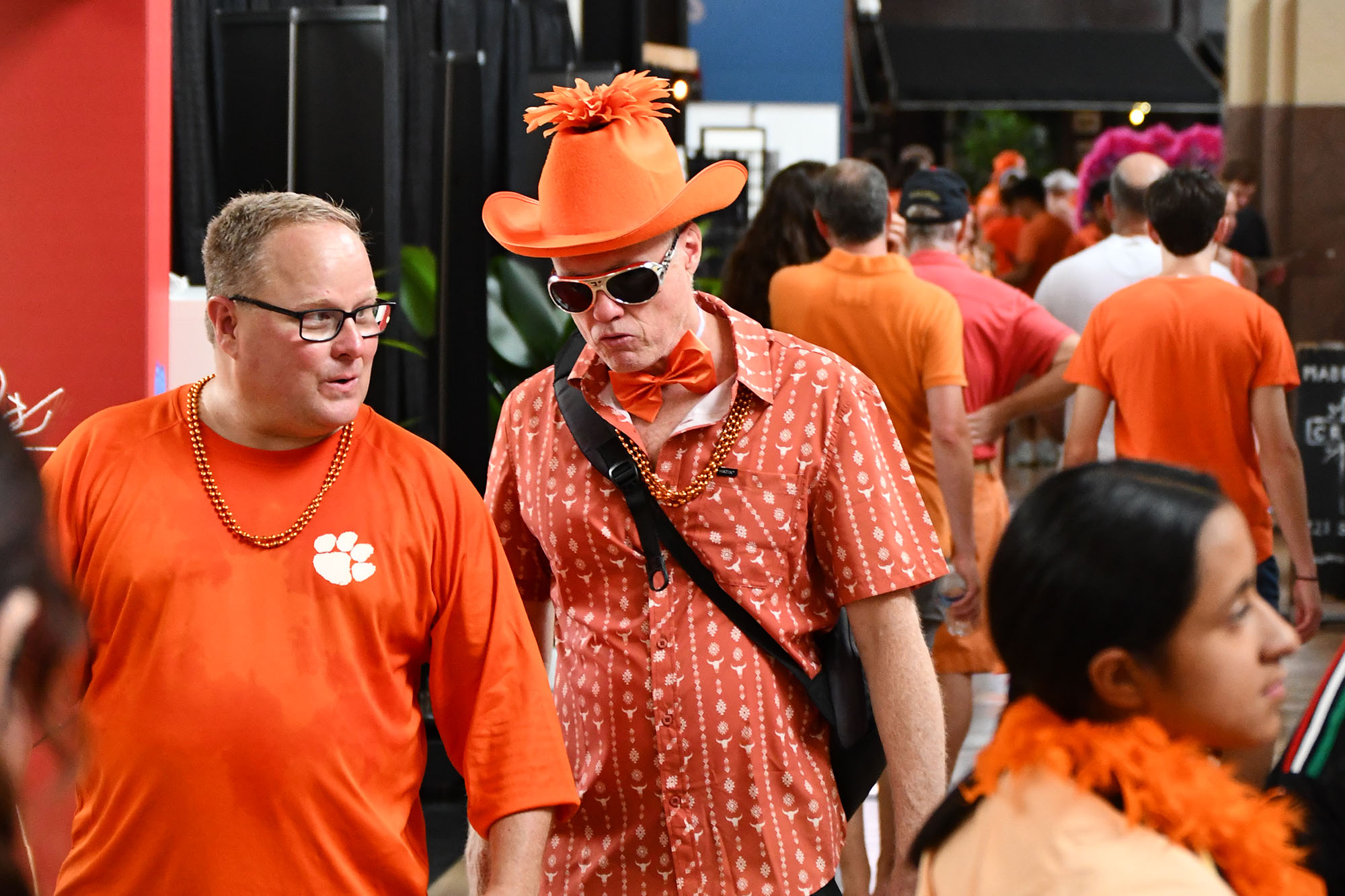 Orange-clad Netherlands supporters and Dutch fans weave through the City of Entrepreneurs marketplace at Union Station following the Oranje Army fanwalk nearby; photo by Tommy Felts, Startland News