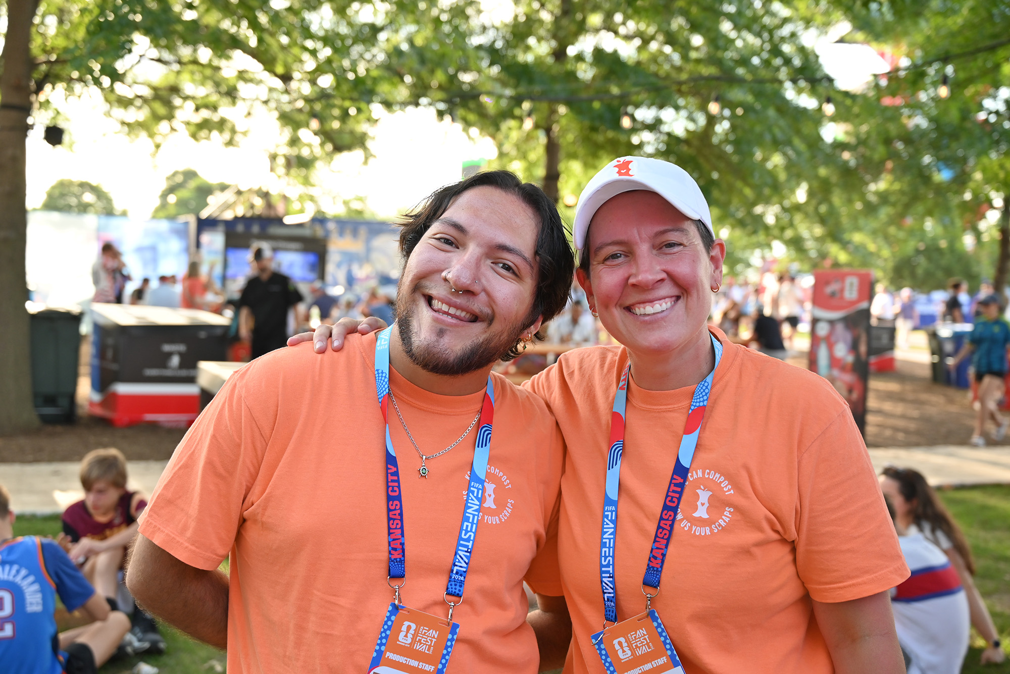 Jacob Esquivel, events coordinator for KC Can Compost; and Abby Smith, events manager, stand together during a shift at FIFA Fan Festival in Kansas City; courtesy photo