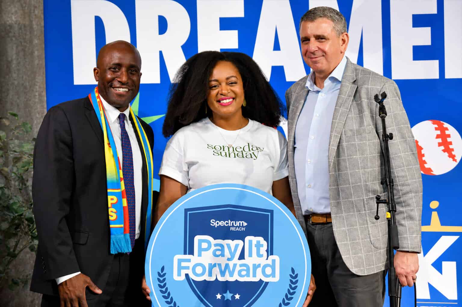 LaToya Ebony Sirls, Someday Sunday, center, smiles after being announced as the winner of a Spectrum Reach Pay It Forward grant at the City of Entrepreneurs' marketplace at Union Station; photo by Tommy Felts, Startland News