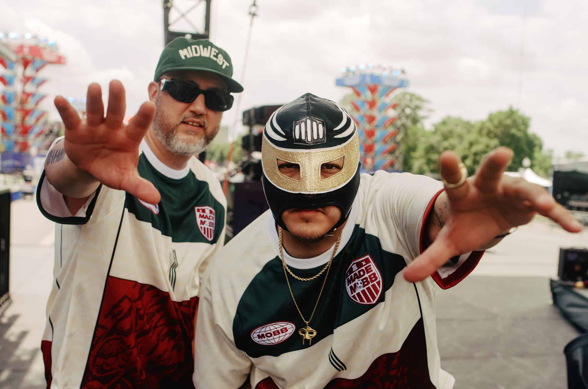 Sin Tope — the duo of Juan Carlos Chaurand of the Grammy-nominated Afro-Latin rock band Making Movies and Kansas City creative FK Menace — pose on stage before their set at FIFA Fan Festival's opening day; photo by Frank Pham