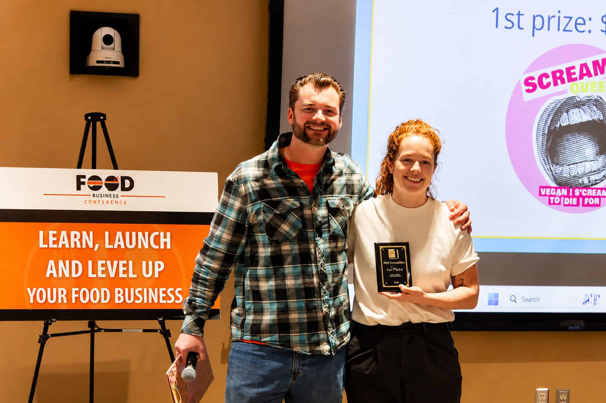 Xander Winkel, director of the Culinary Kitchens Mid-Continent Public Library, and Zoe Mays,  founder of Scream Queens and the March 2026 pitch competition winner for Square One; photo by Nikki Overfelt Chifalu, Startland News