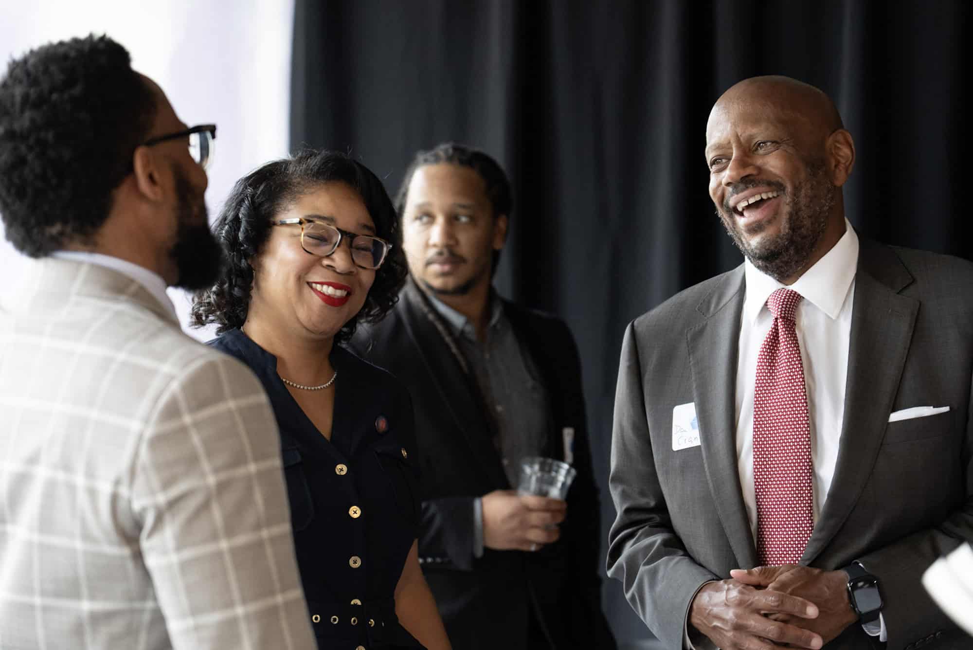 Dan Cranshaw, chairman of the CCED Sales Tax Board, right, shares a laugh with Jeremy Davis, director of CCED, and Melissa Patterson Hazley, councilwoman for Kansas City, Missouri, during a premiere event to celebrate the release of the “Investing in Legacy” mini-documentary promoting the Central City Economic Development (CCED) Sales Tax Program ahead of an Aug. 4 vote in Kansas City; photo courtesy of EDCKC