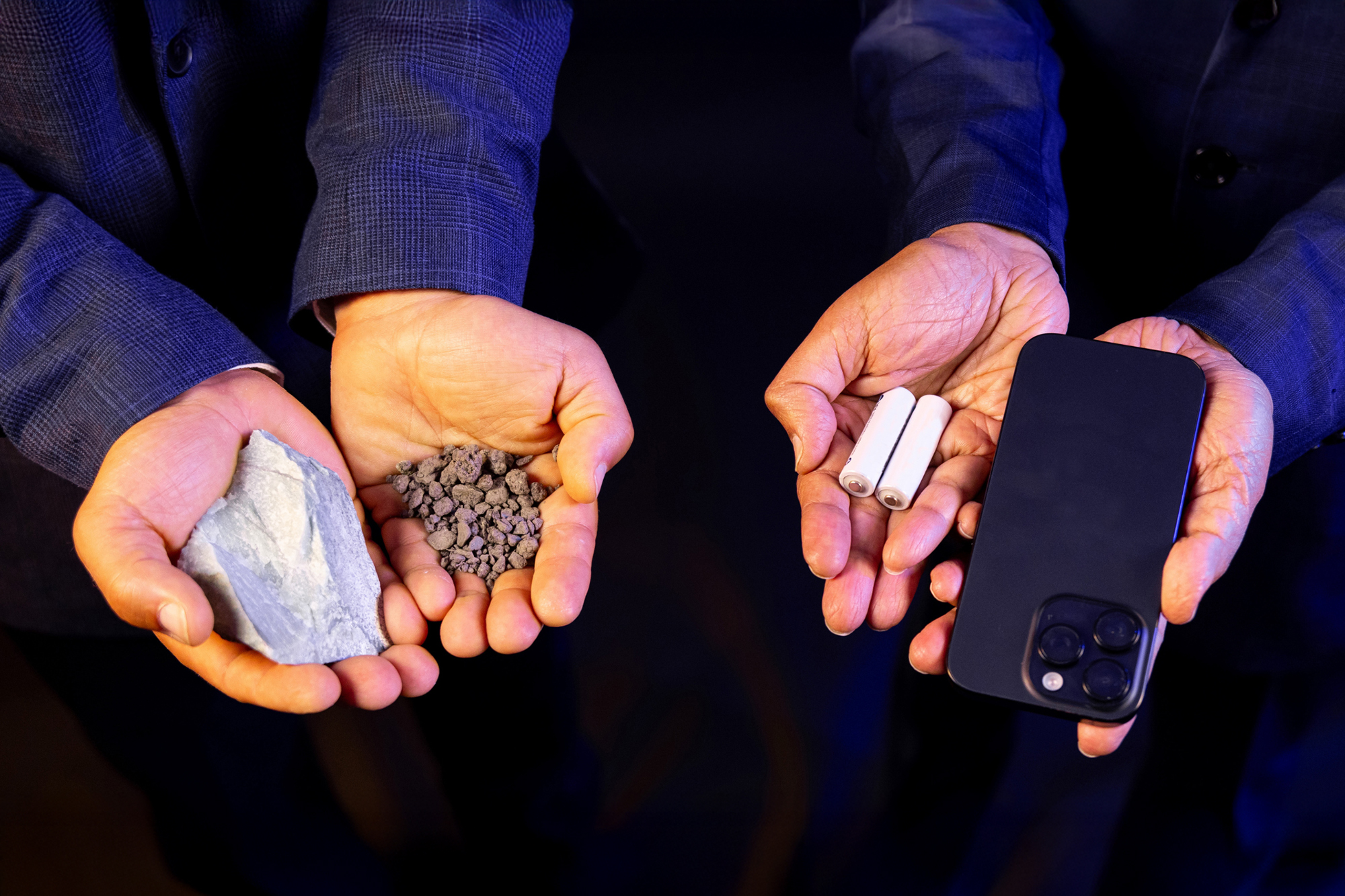 UMKC's Anthony Caruso and Mauli Agrawal hold critical materials and the devices they become in an image promoting a university-led effort that earned a potential $160 million award from the U.S. National Science Foundation; photo courtesy of UMKC