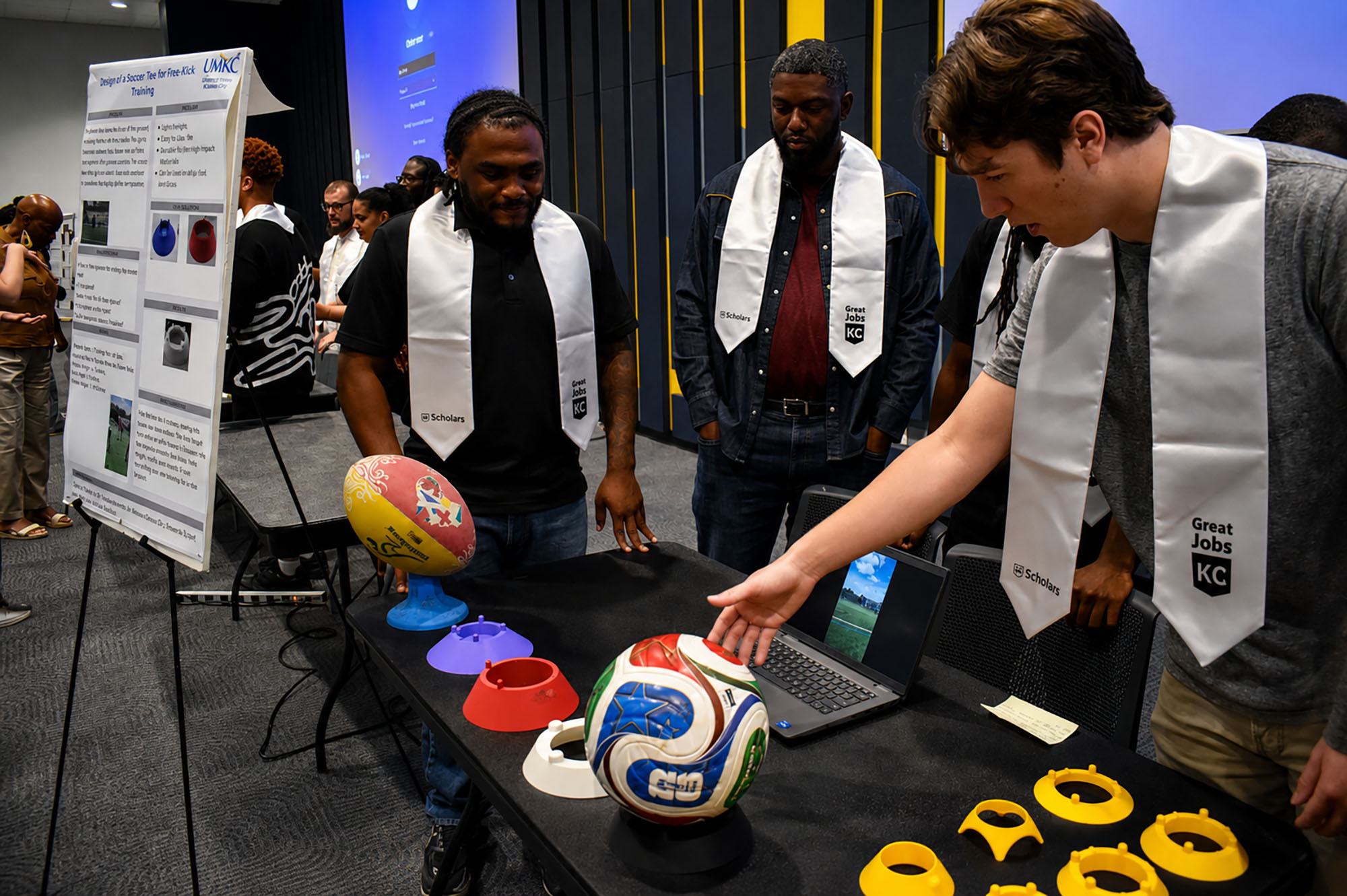 Campbell Higgins, a UMKC student participating in the Great Jobs KC program, discusses his group's 3D-printed soccer tee project; photo by Taylor Wilmore, Startland News