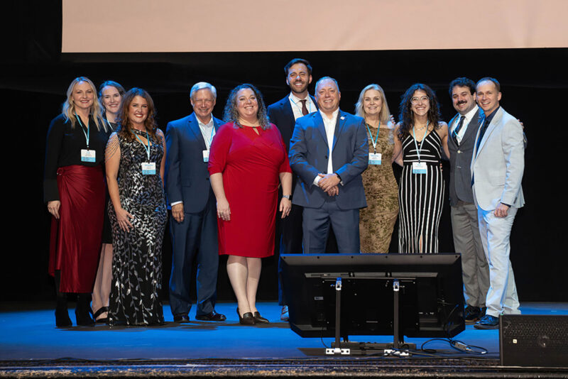 Members of the BioNexus KC team stand on stage at the Midland Theater in November during a 25th anniversary event honoring BioNexus KC; photo courtesy of BioNexus KC
