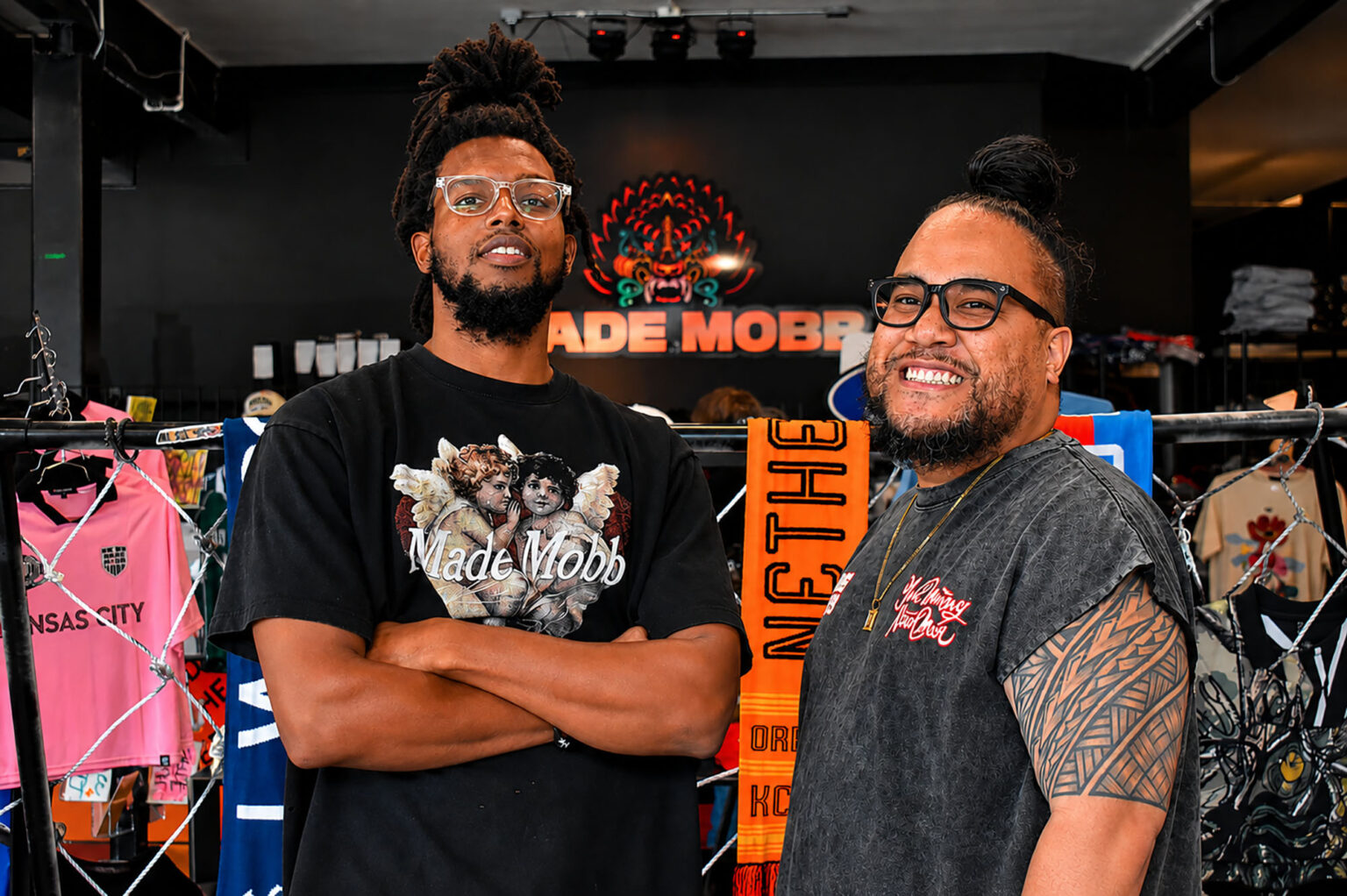 Alex Harris, shop manager at MADE MOBB, and Mark Launiu, co-founder of the Kansas City streetwear brand, inside the MADE MOBB storefront at 221 Southwest Blvd; photo by Taylor Wilmore, Startland News