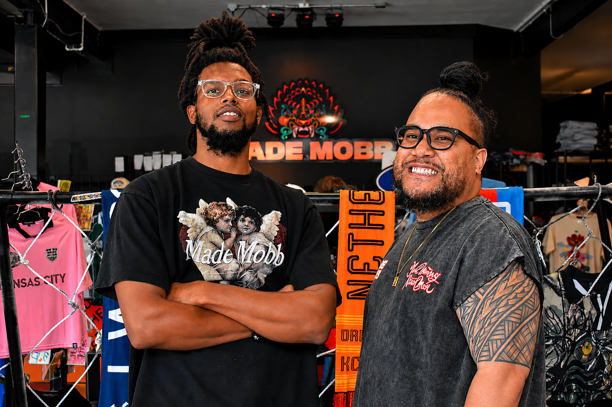 Alex Harris, shop manager at MADE MOBB, and Mark Launiu, co-founder of the Kansas City streetwear brand, inside the MADE MOBB storefront at 221 Southwest Blvd; photo by Taylor Wilmore, Startland News