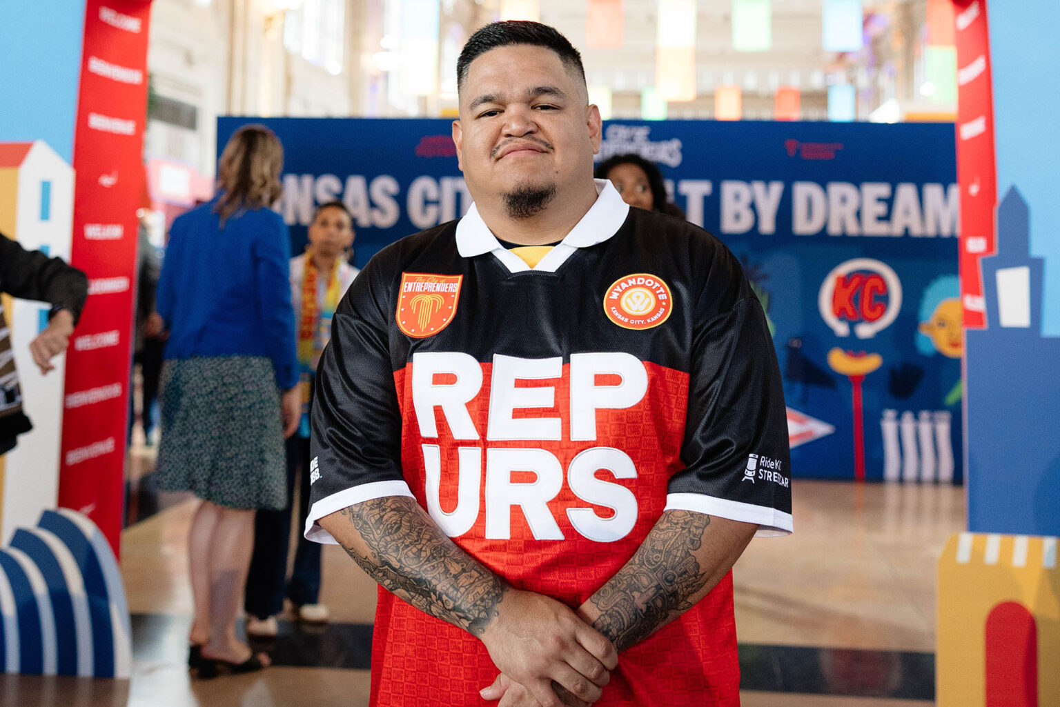 Max Ayalla stands at the entrance to the City of Entrepreneurs marketplace inside Kansas City's Union Station; photo courtesy of EDCKC
