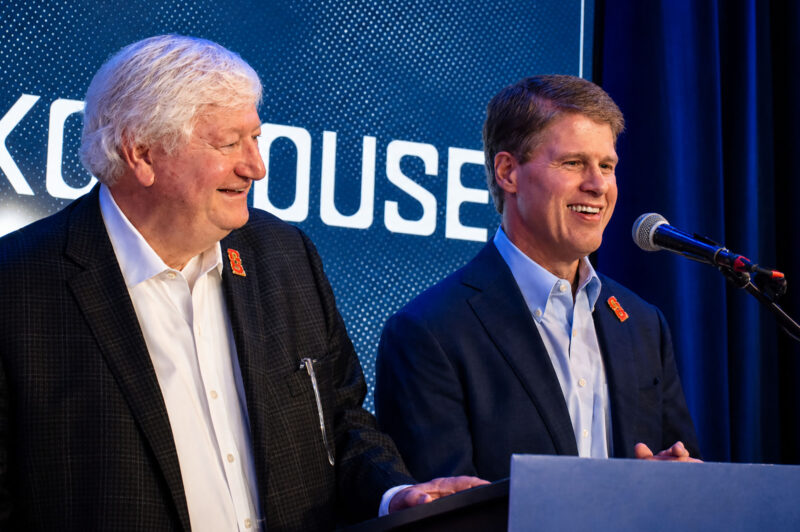 Cliff Illig and Clark Hunt, honorary co-chairs of KC2026, the Kansas City host organization for FIFA World Cup 2026, share a laugh on stage at KC House on the Country Club Plaza; photo by Nikki Overfelt Chifalu, Startland News