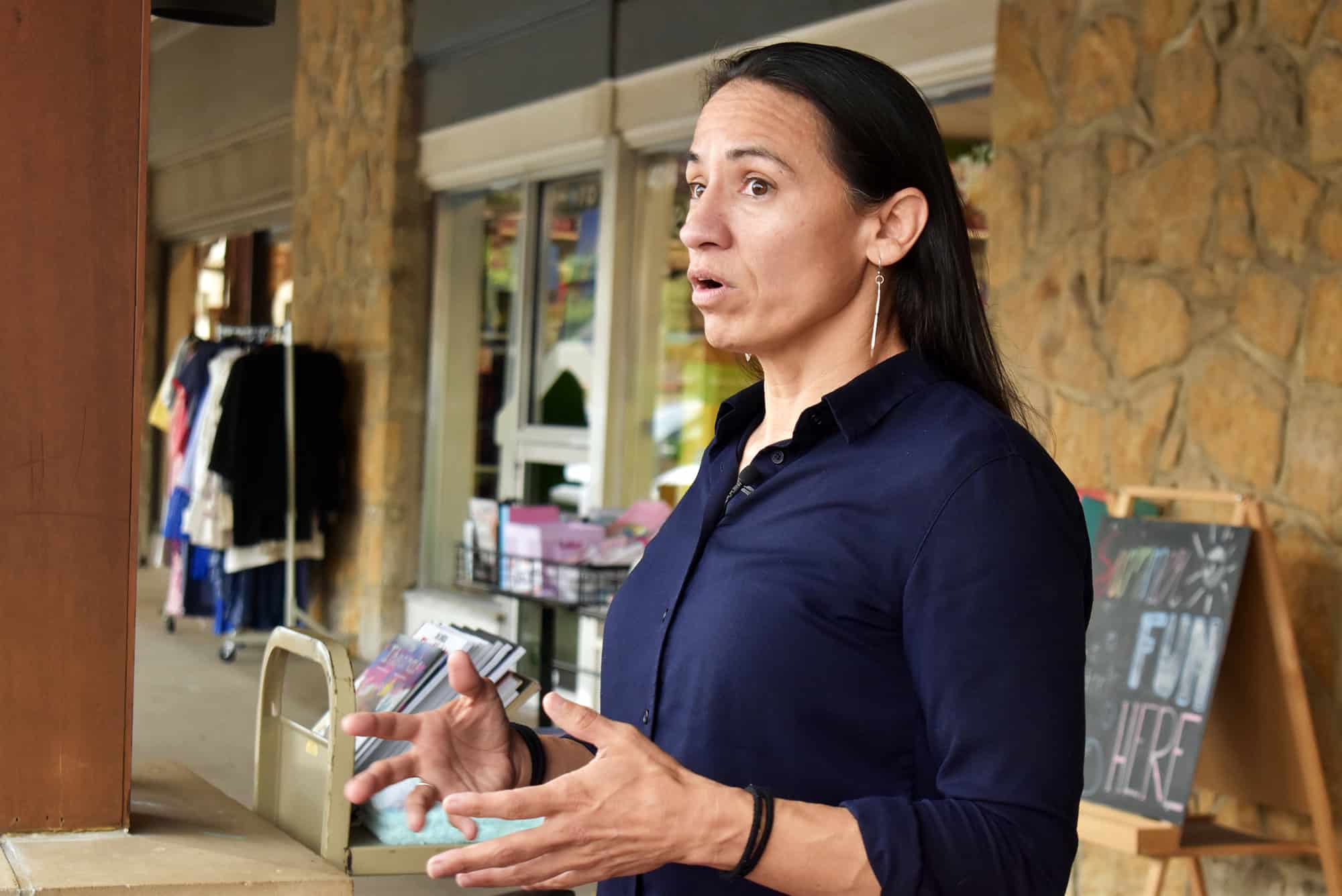 U.S. Rep. Sharice Davids, D-Kansas, speaks with the media outside The Shops of Prairie Village; photo by Nikki Overfelt Chifalu, Startland News