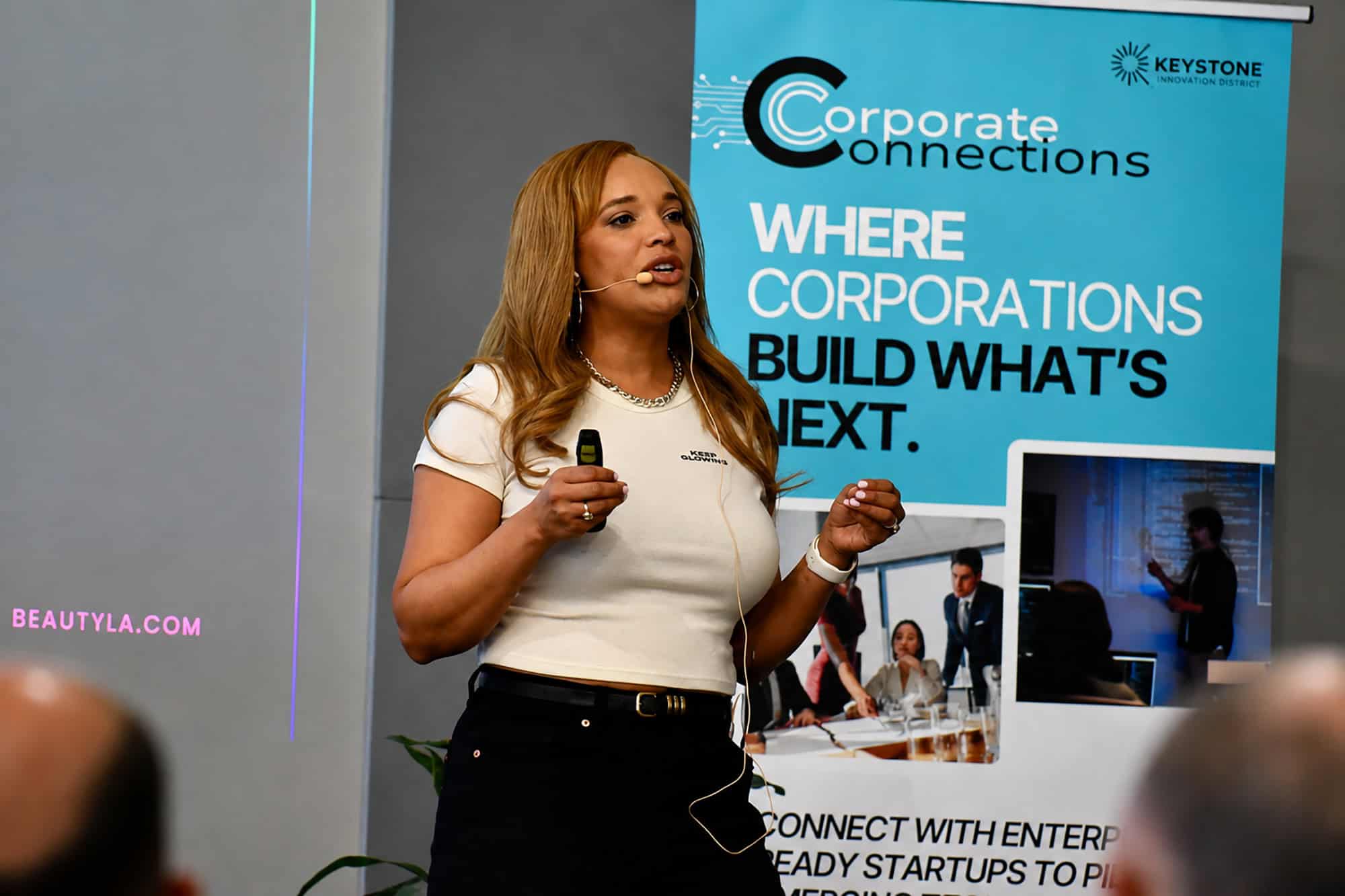 Montre Moore, founder of Los Angeles-built AMP Beauty, pitches her company during a demo day-style graduation for LaunchKC's Social Venture Studio; photo by Nikki Overfelt Chifalu, Startland News