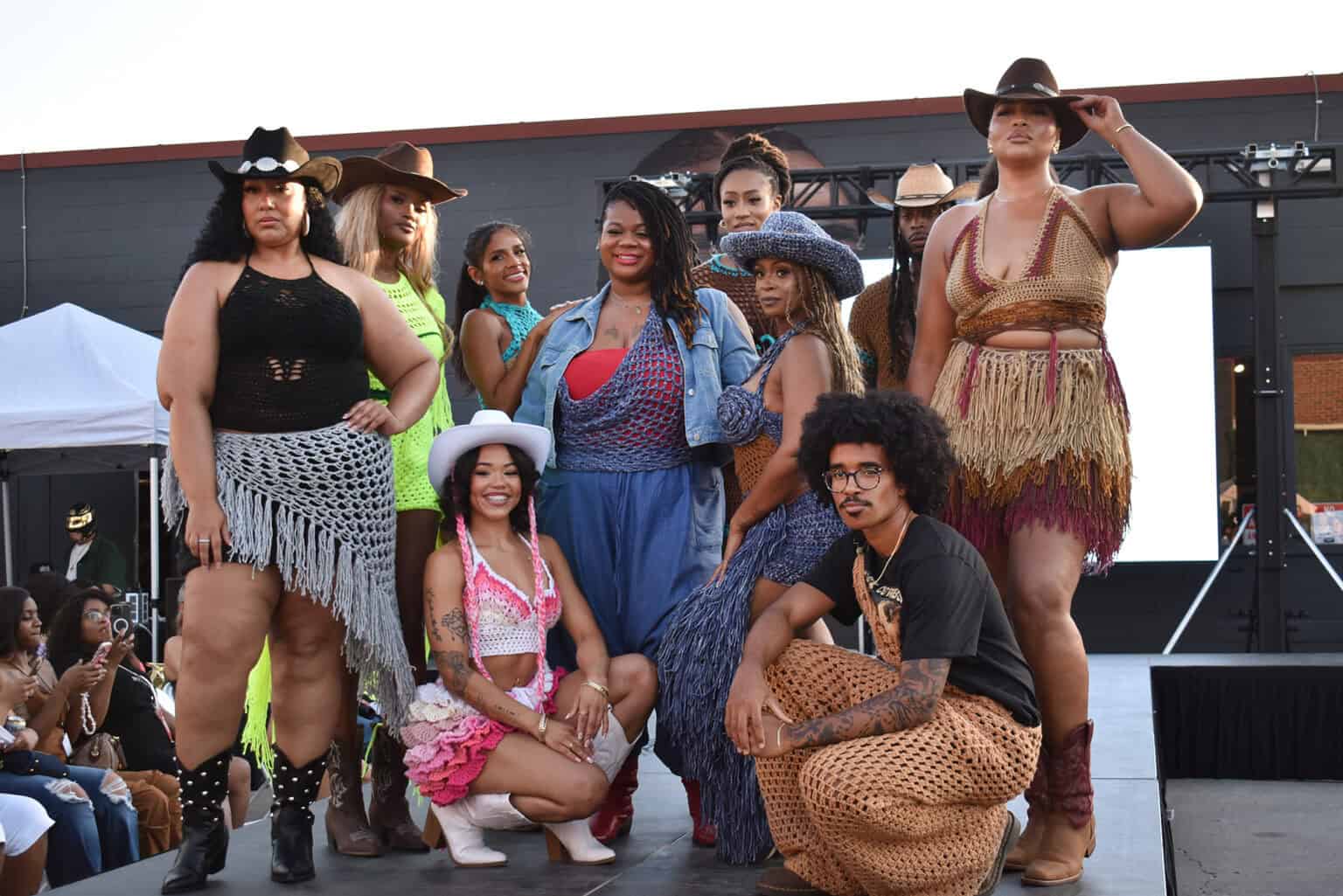 Rachel Hughes, founder of Studio Rae, and her models pose at the end of the runway during The Kritiq Fashion Show outside MADE MOBB on Southwest Boulevard in Kansas City; photo by Taylor Wilmore, Startland News