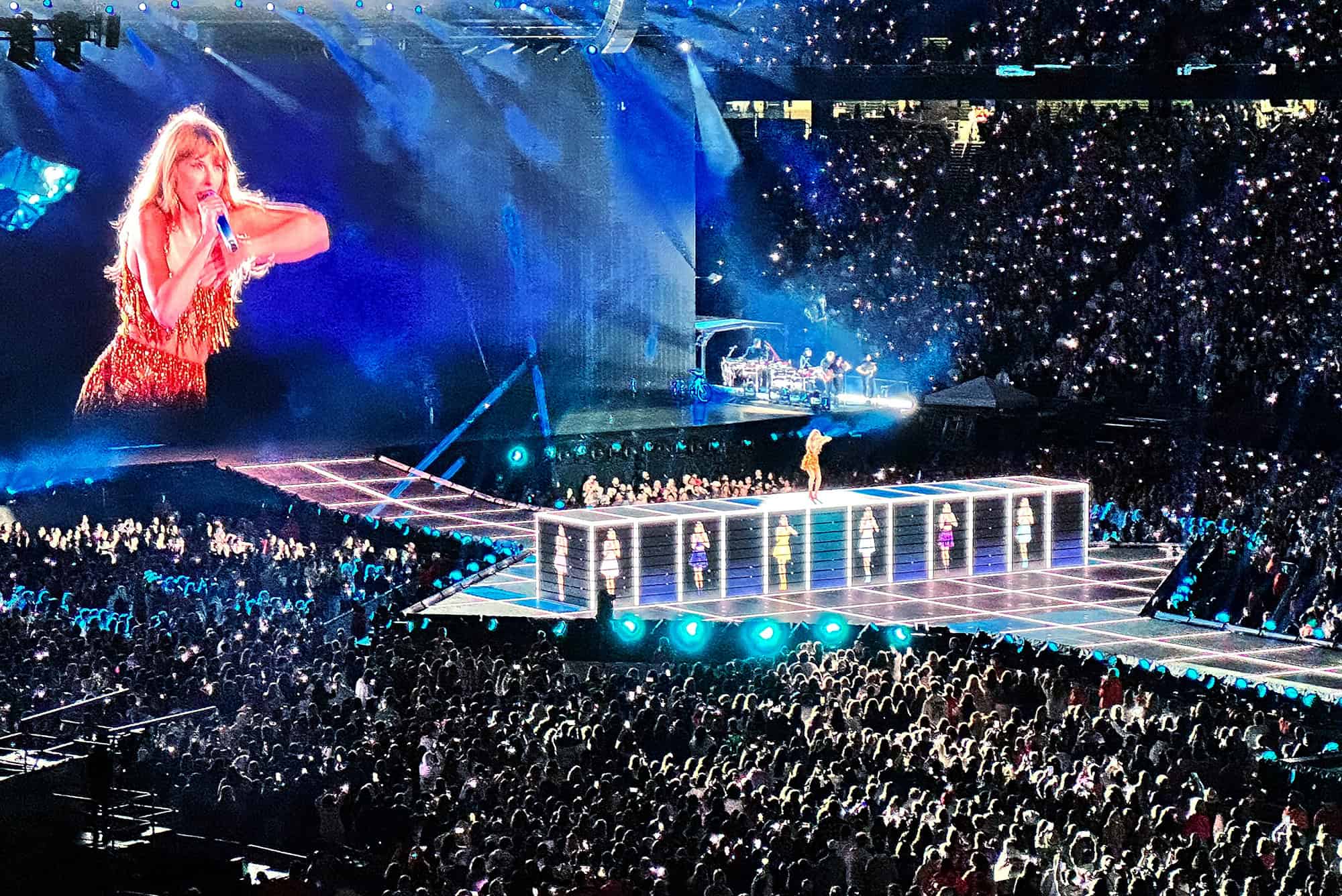Taylor Swift performs in May 2023 at Gillette Stadium in Foxborough, Massachusetts, as part of the US Era's Tour, which was chronicled in a film for AMC Theatres; photo by Stephen Mease, Unsplash