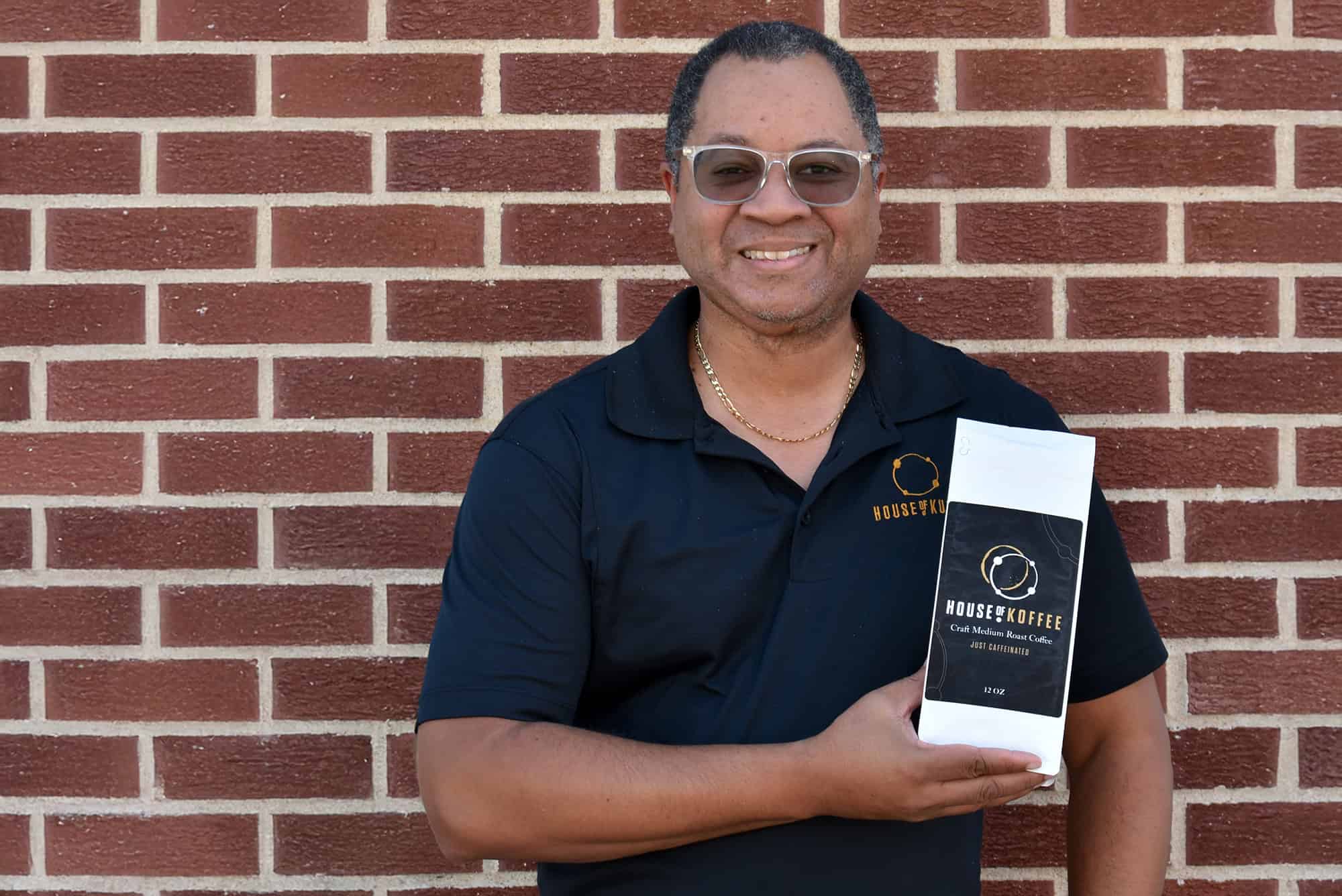 Reggie Harris, co-founder of House of Koffee, with a bag of Sarah’s Blend; photo by Taylor Wilmore, Startland News