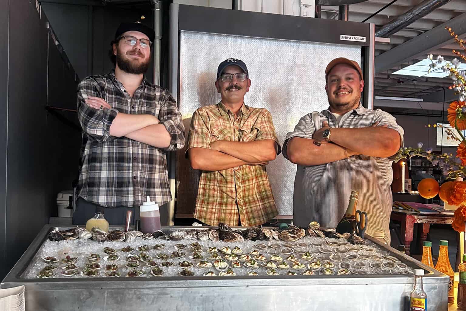 Brooks Mackender, Brad Barta, and Brandon Hayden inside the new The Shuckers Union at 1739 Oak St. in the East Crossroads; photo by Joyce Smith