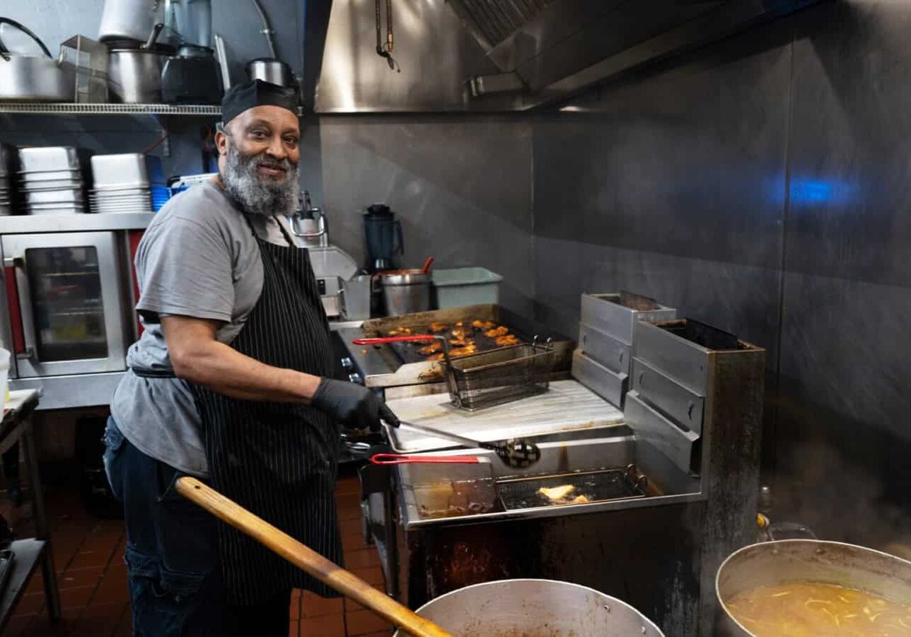 Chef-owner Abdul Hatimi of Yasmeen Cafe, located at 1447 Independence Ave., in Kansas City, Missouri, works in his kitchen recently for the lunch hour; photo by Todd Feeback, Flatland