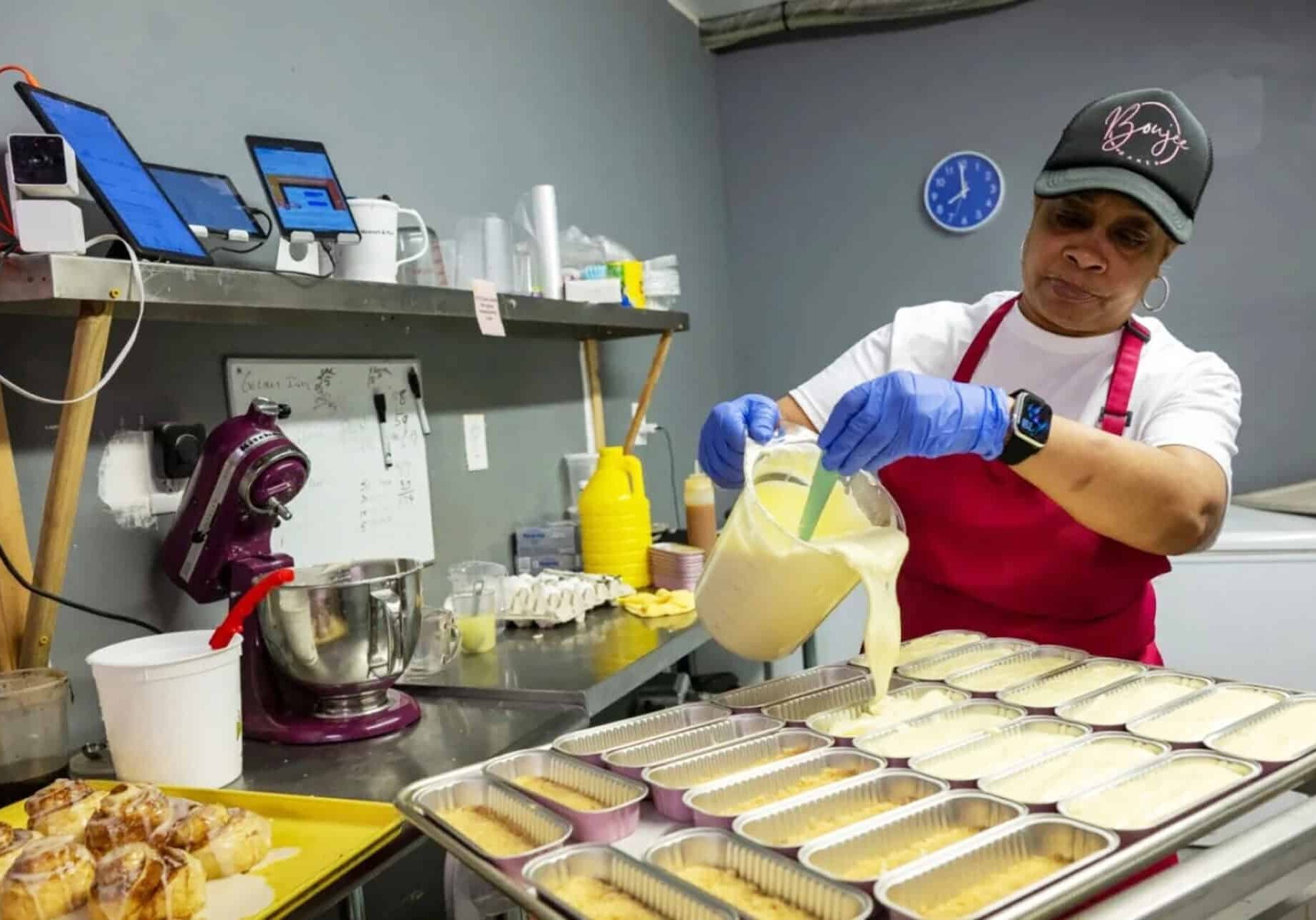Boujee Bakery owner Joyce Watts prepares cheesecakes early in the morning at her establishment on 2311 E. 12th St. in Kansas City, Missouri. Flavors include salted caramel, Oreo, lemon and sweet potato; photo by Todd Feeback, Flatland